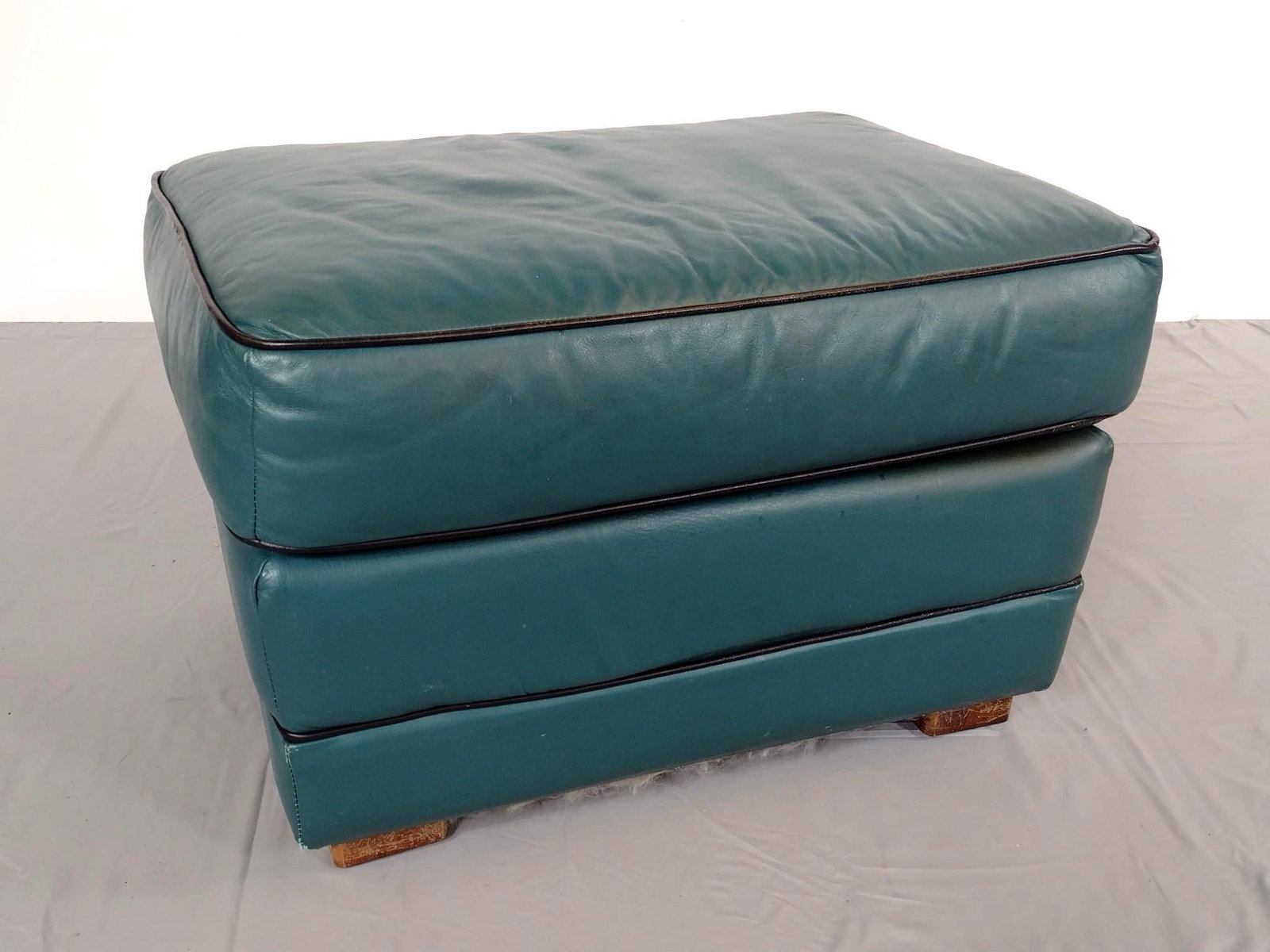 LeatherTech Green Leather Ottoman: 28" wide X 21" deep X 18" high. Has some spots of wear. MG.