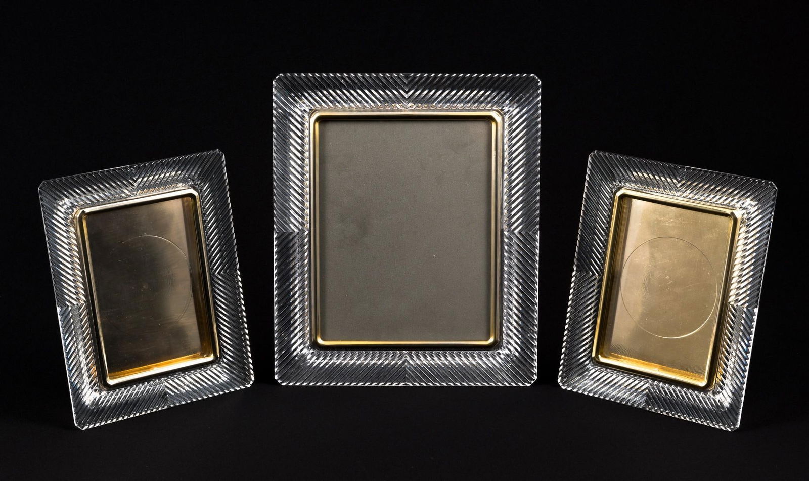 3 Waterford Picture Frames: Overall 9-1/2" to 12-1/4" high x 9-1/2" to 10-1/2" wide. Two smaller frames with bracket not attached.