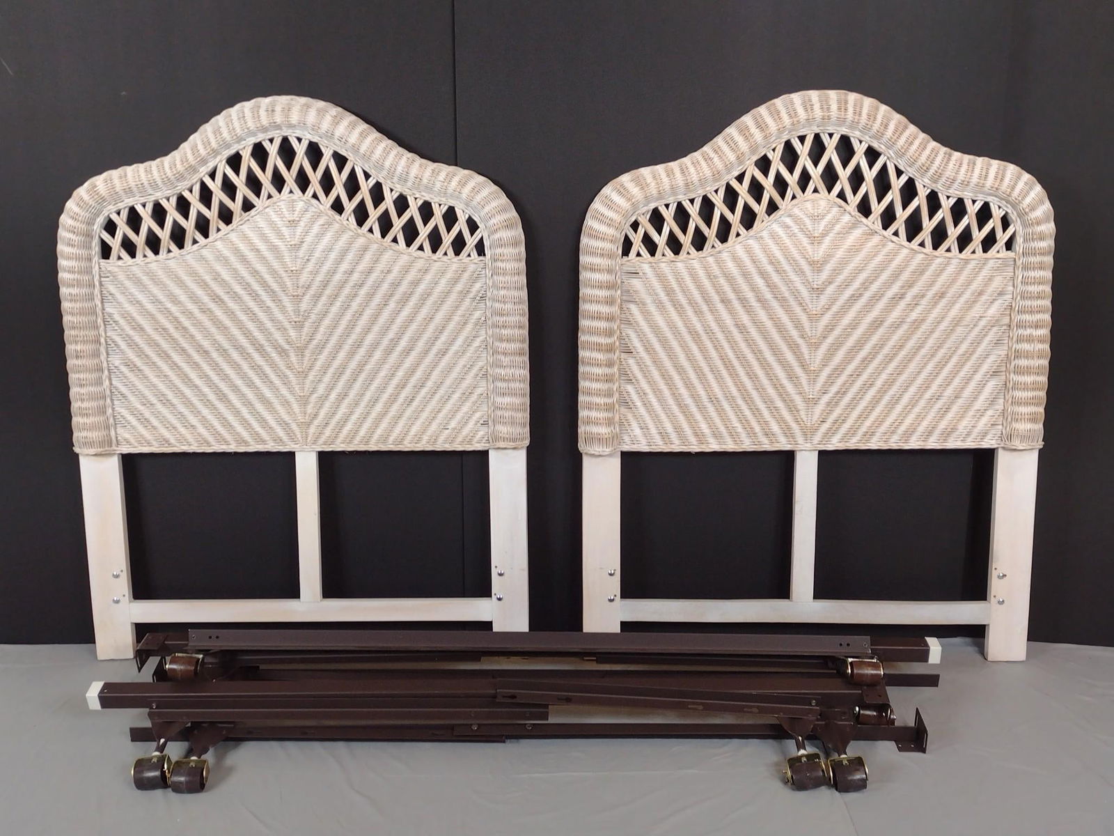 Pair Of Wicker Twin Beds: Headboards 42" wide X 52" high. Includes Hollywood frame. MG.