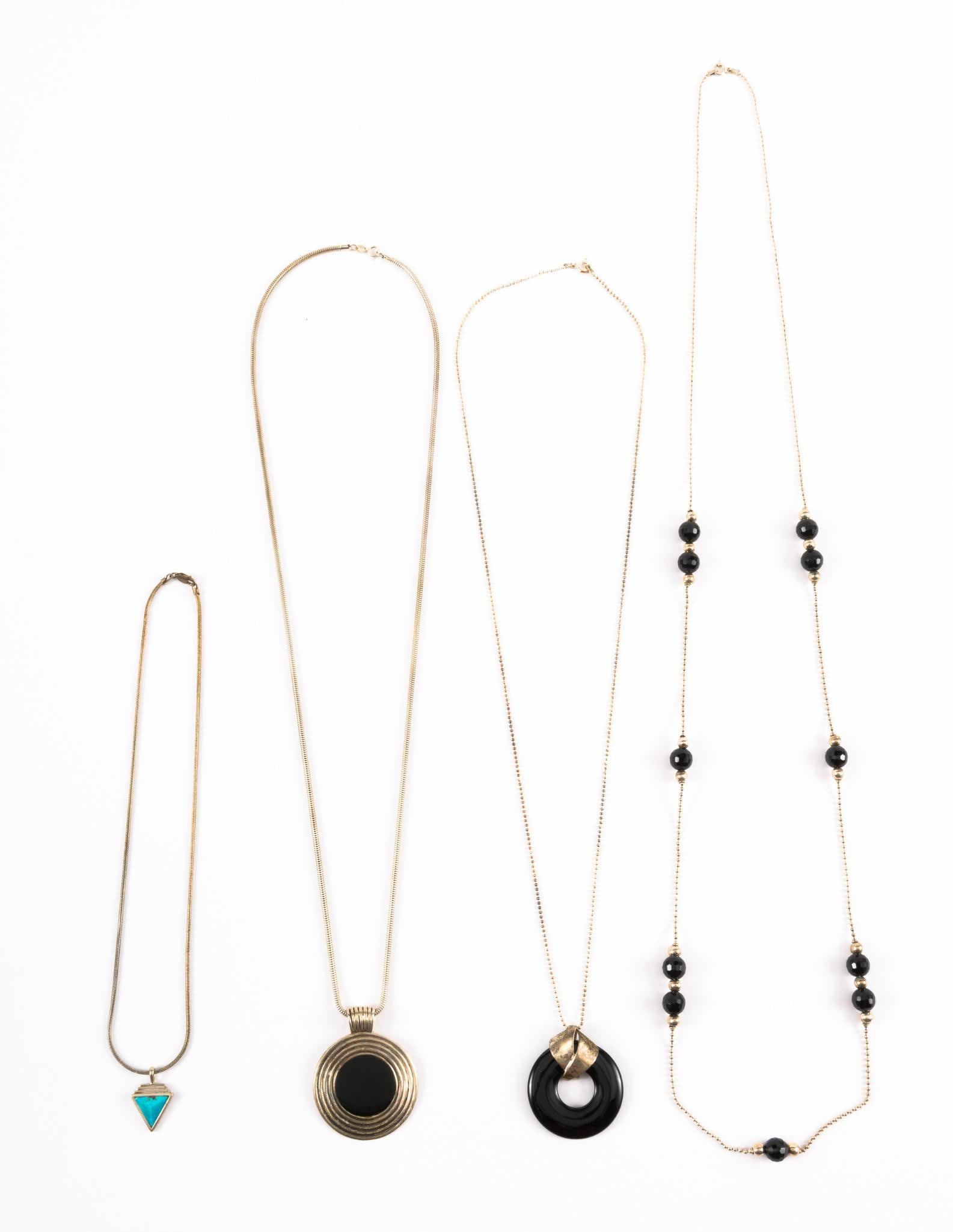 4 Sterling Necklaces: Including onyx and turquoise pendants. All marked 925. 3/4" to 1-3/4" wide x 1-1/8" to 1-3/4" long chains 18" to 29-3/4" long. MEG