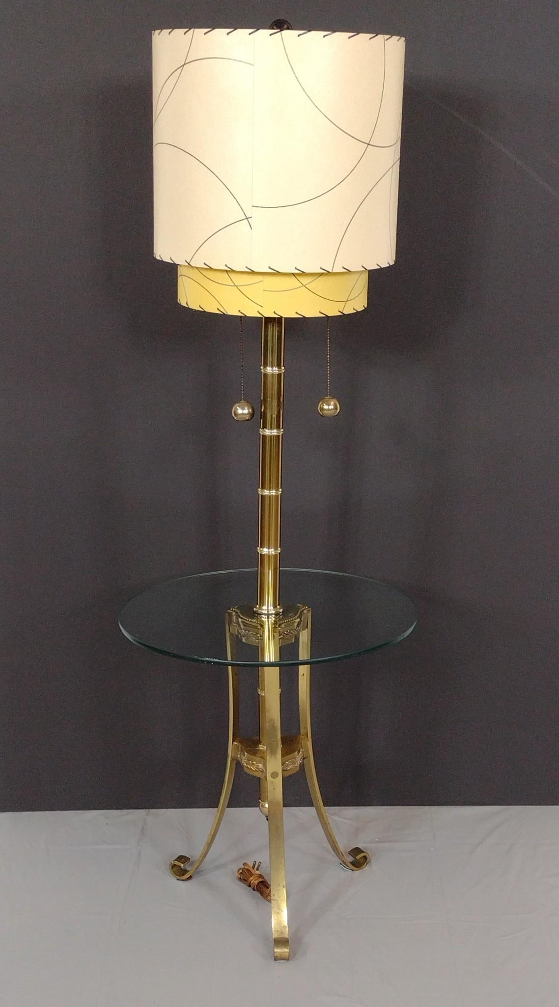 Circular MCM Brass/Glass Lamp Table: NOT ELIGIBLE FOR IN-HOUSE SHIPPING. 20" diameter X 58-1/2" high. Working. MG.