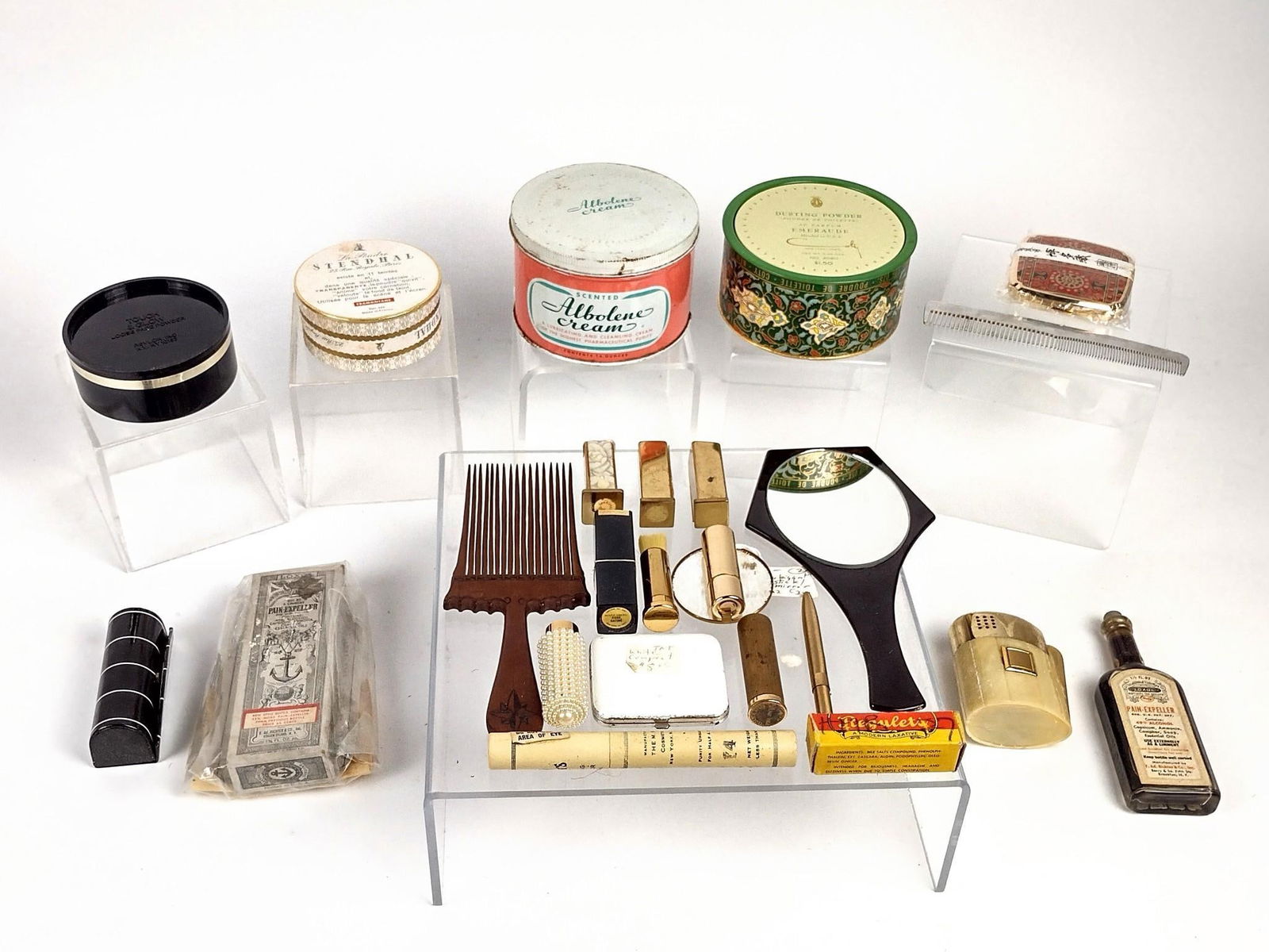 Large Collection of Vintage Cosmetics and Comb: NOT ELIGIBLE FOR IN-HOUSE SHIPPING. Also includes hand mirror. All sold as is.