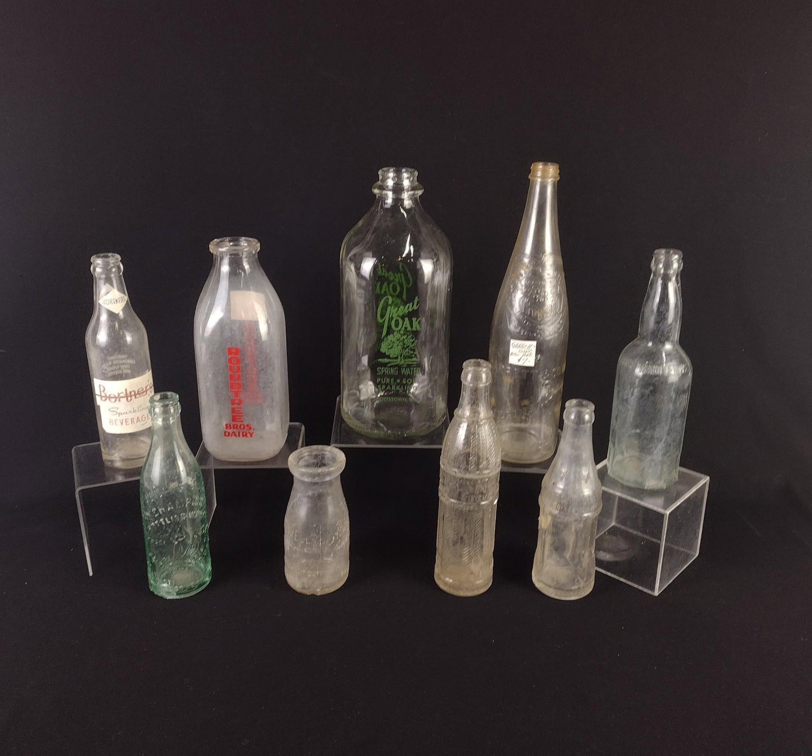 9 Vintage Milk and Soda Bottles incl Hanover, PA: Also includes Baltimore Maryland, Philadelphia Pennsylvania, and more. 5-1/2" to 12" high. Some discoloration. LR