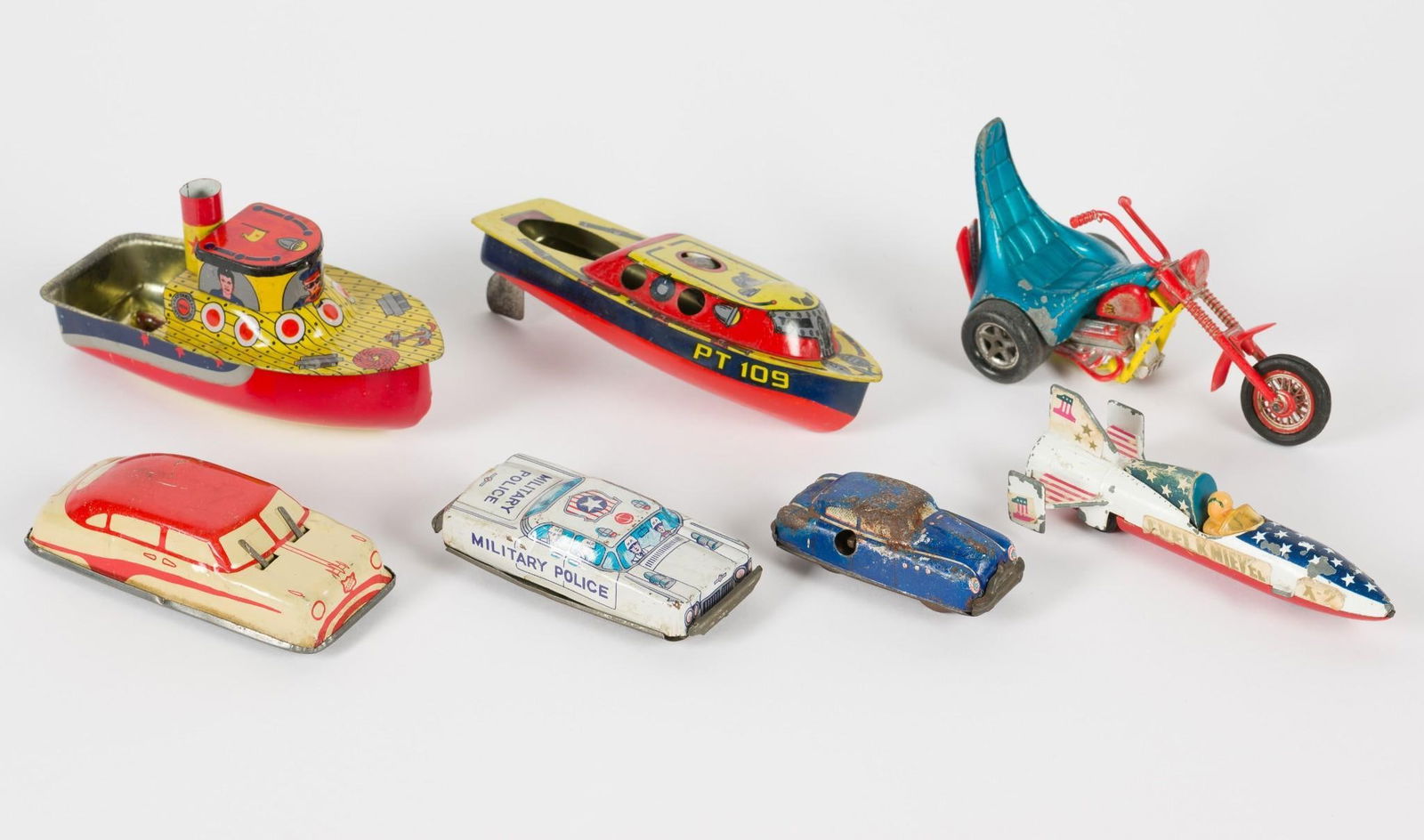 7 Vintage Toys incl 10 Litho incl Evel Knievel: 2-3/4" to 5-3/4" long.