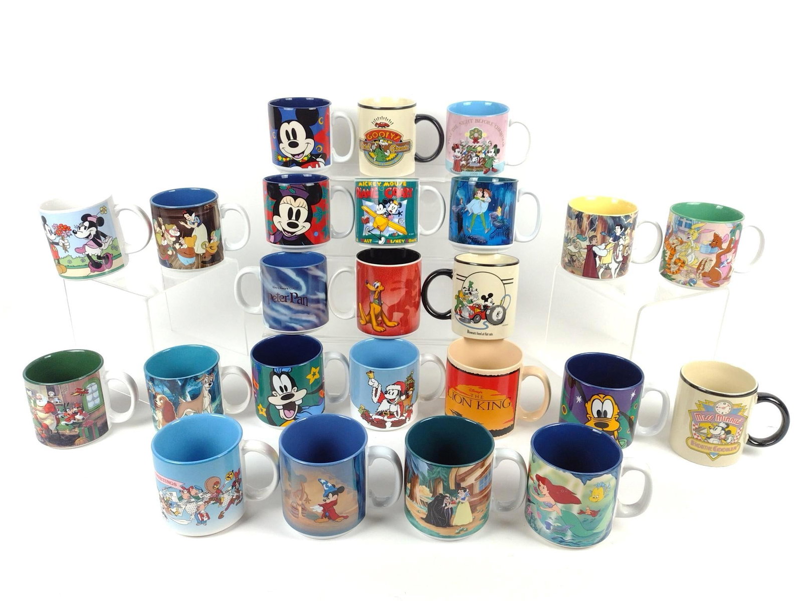 24 Disney Mugs incl Little Mermaid: Also includes Fantasia, Winnie The Pooh, Snow White, and more. Each approximately 3-1/2" high.