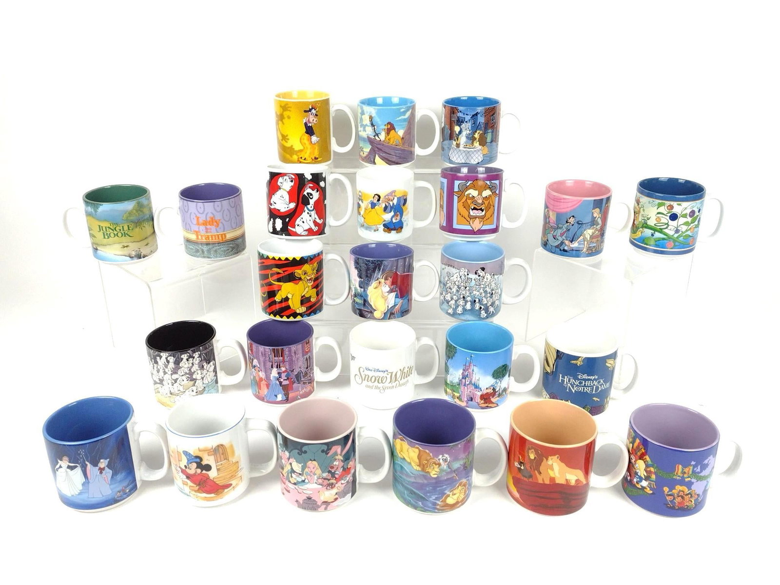 24 Disney Mugs incl Beauty and the Beast: Also includes Sleeping Beauty, Lion King, Jungle Book, and more. Each approximately 3-1/2" high.
