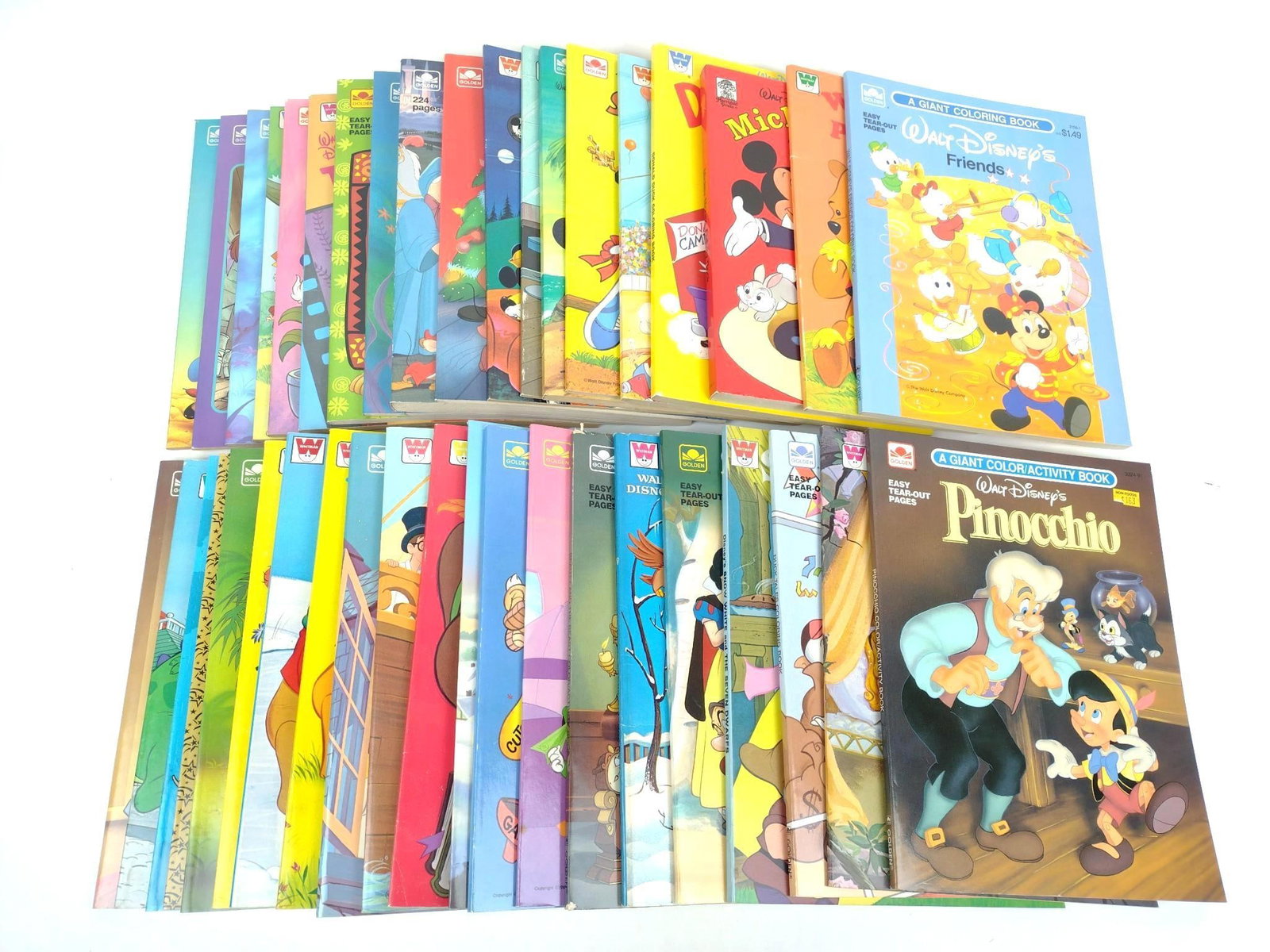 40 New Old Stock Disney Coloring / Activity Books: Includes Mickey and Friends, Winnie The Pooh, and more.