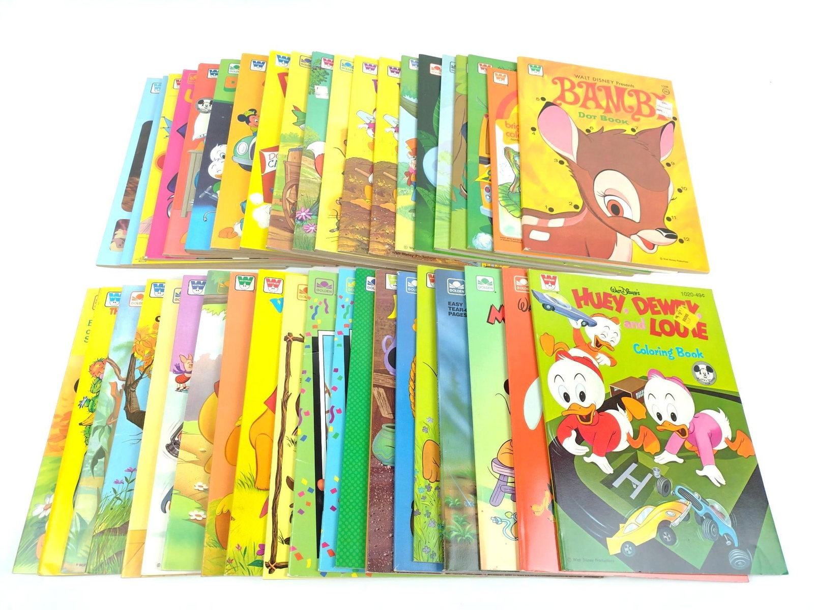 40 New Old Stock Disney Coloring / Activity Books: Includes Bambi, Chip 'N' Dale, Huey Dewey and Louie, and more.