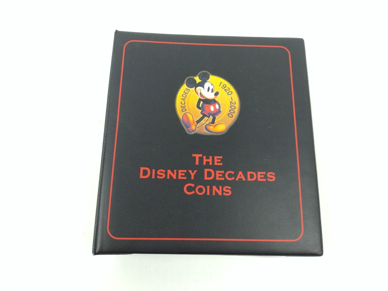 79 "The Disney Decades" Coins in Binder (1920s-2000s) (1 of 16)