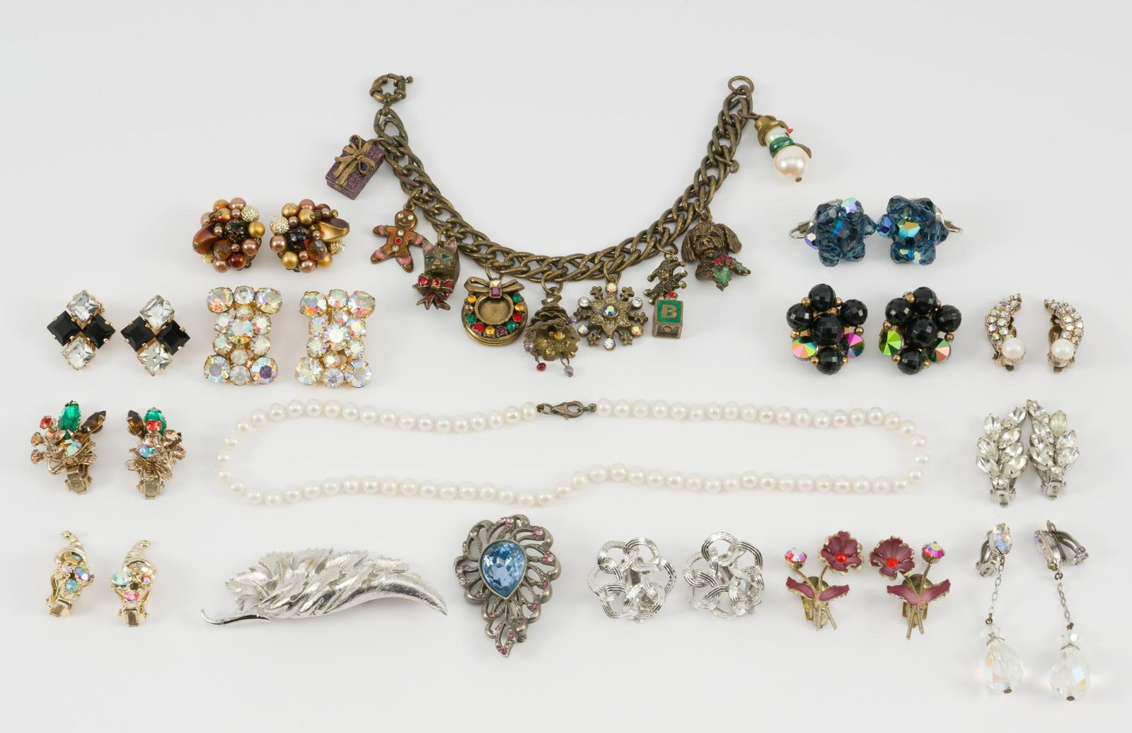 Grouping of Costume Jewelry: Includes Pearl necklace with sterling clasp, 18". Various costume earrings and pins including rhinestone, Coro.