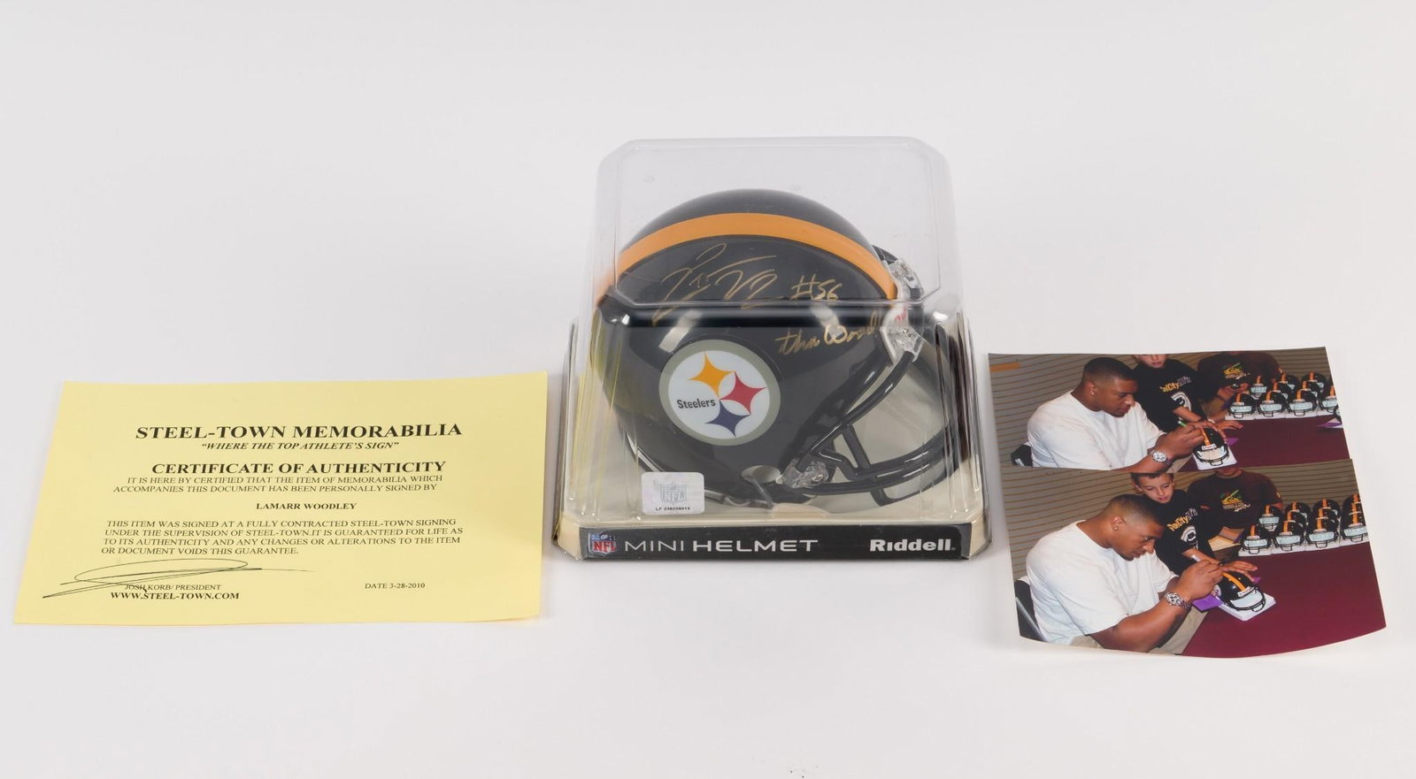 Lamarr Woodley Autographed Steelers Mini Helmet: With COA. Picture of Lamarr Woodley signing helmet. In original box. 5-1/4" wide x 5-1/8" high.