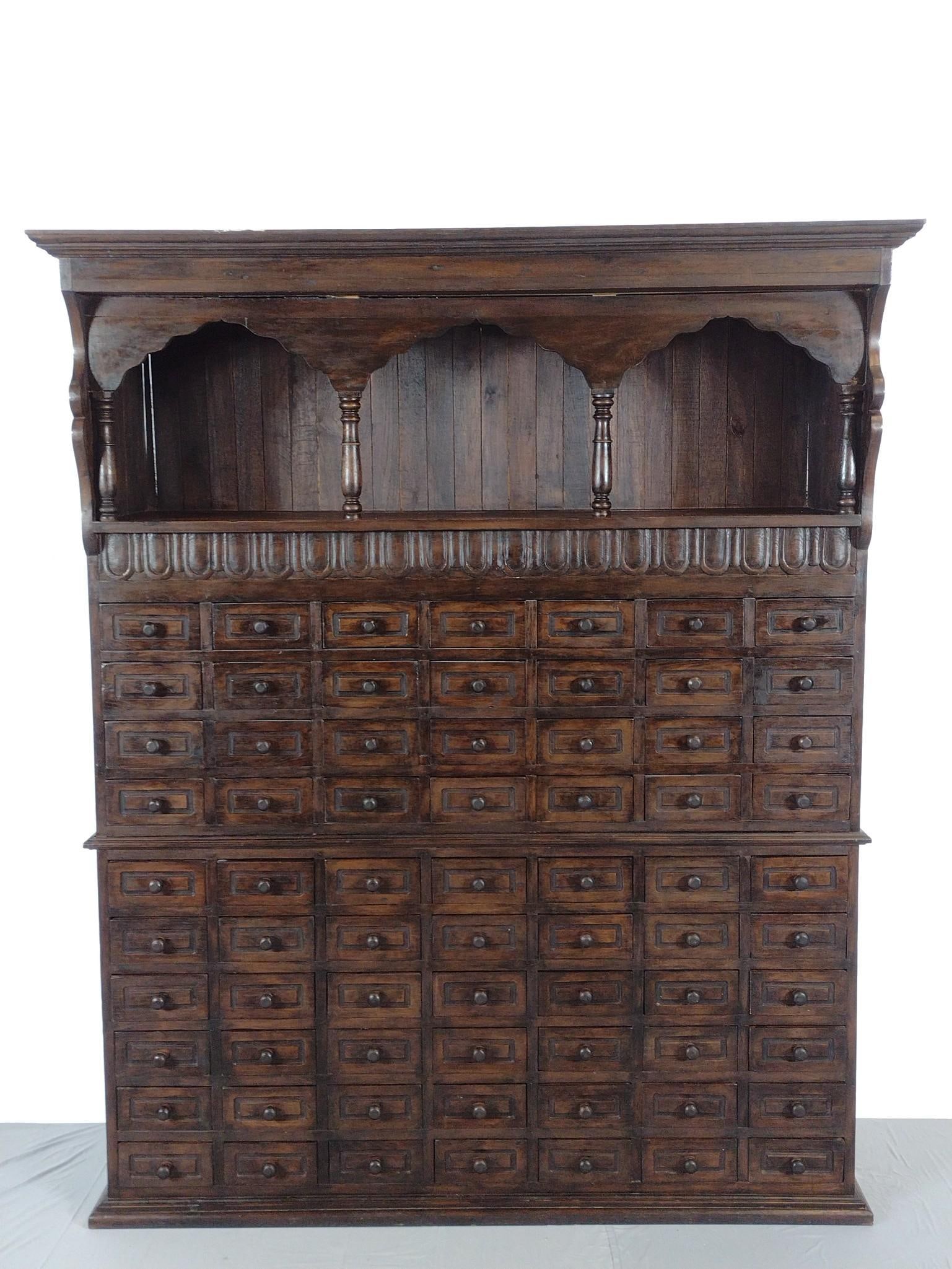 Apothecary Cabinet With 70 Drawers: NOT ELIGIBLE FOR IN-HOUSE SHIPPING. 2 part cabinet. Overall: 63-1/2" wide X 22-1/2" deep X 77-1/2" high. The top section is 63-1/2" wide x 22-1/2" deep x 46-1/2" high. The bottom section is 63-1/2" wi