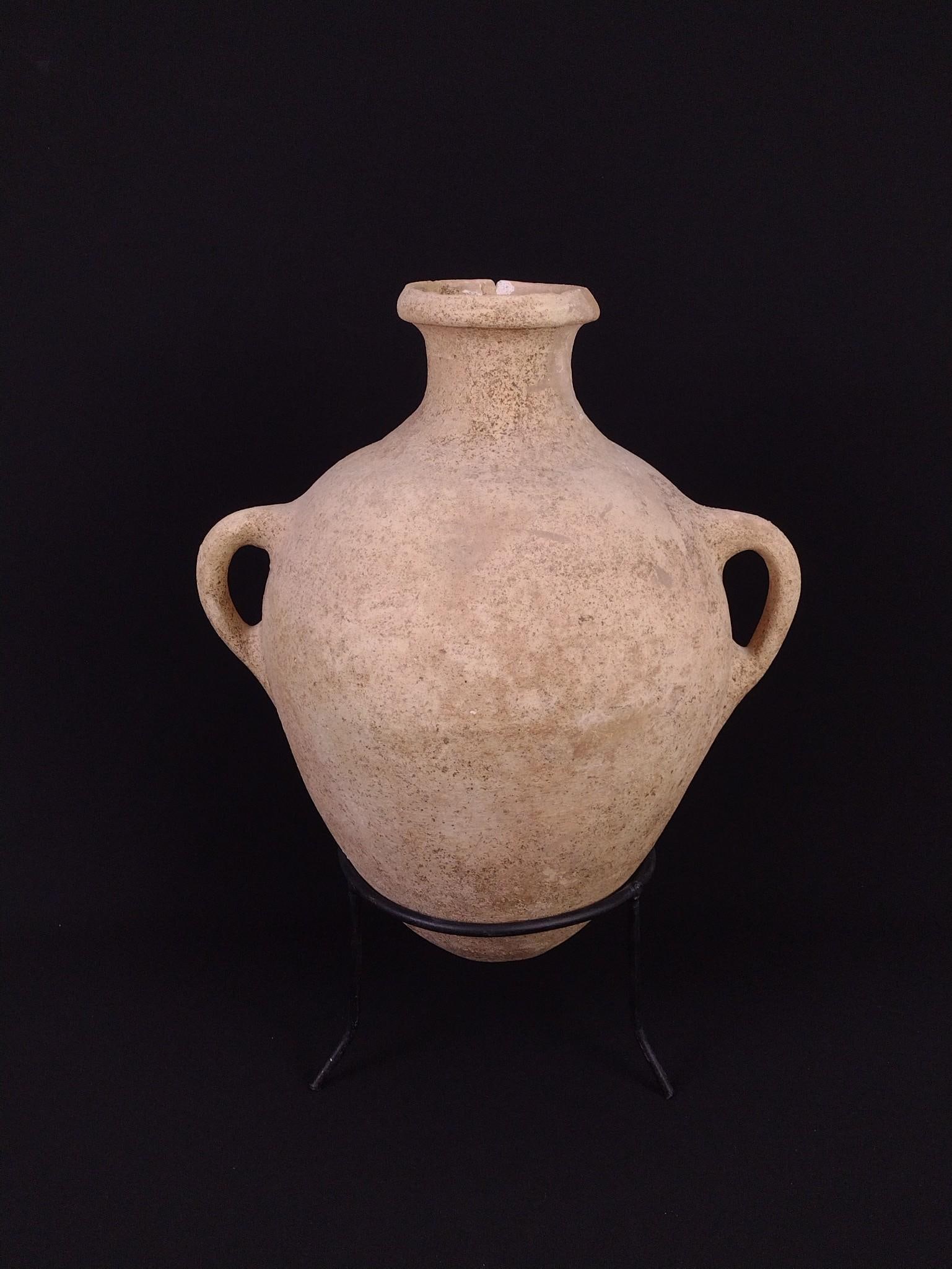 2 Handled Amphora: NOT ELIGIBLE FOR IN-HOUSE SHIPPING. Overall with stand: 15" wide x 11-1/2" deep x 20" high. Loss to top rim.