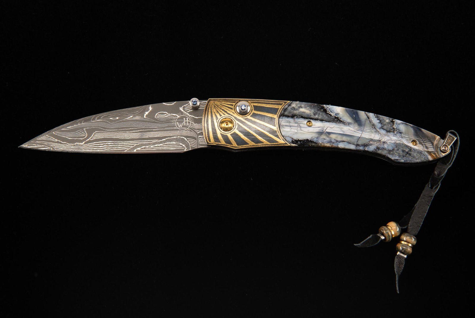 William Henry B07 Westcliff Knife: DESCRIPTION: Stainless "Ribbon Lace" damascus blade by Mike Norris. Koftgari inlaid 18k gold bolster. Fossil mamoth tooth scales. Sapphire thumb/button stones. Lanyard with sterling silver bail. Inclu