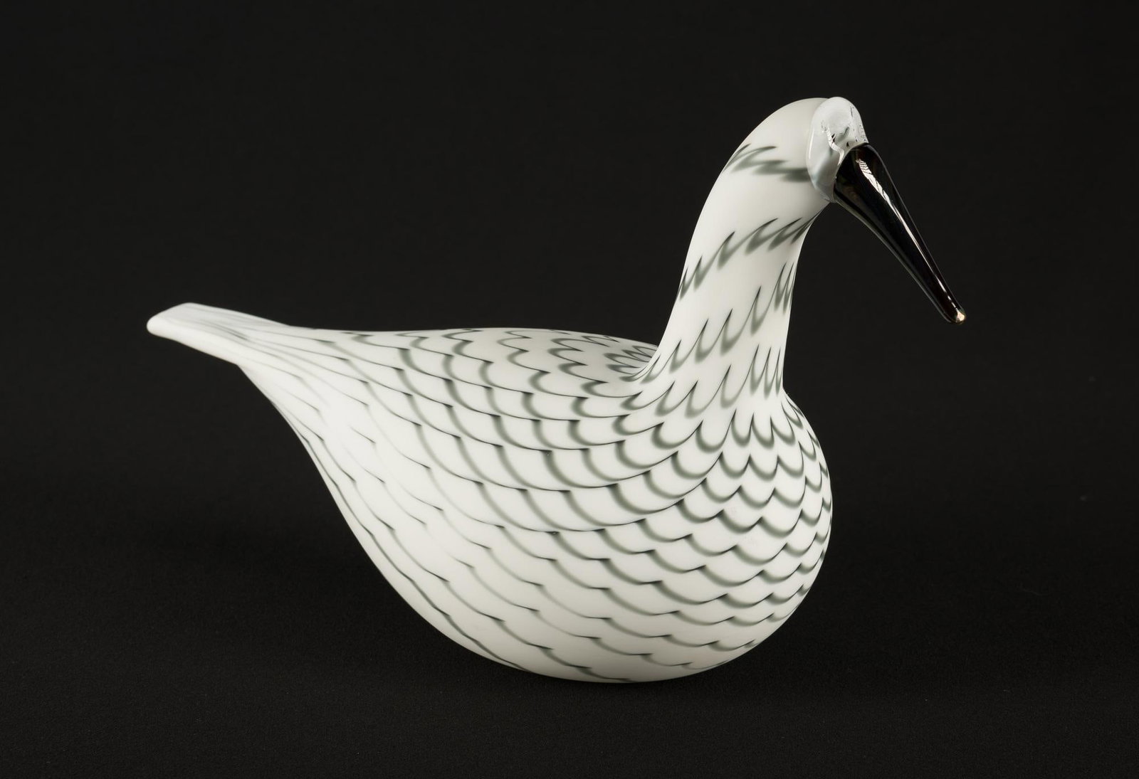 Oiva Toikka Glass Bird Grey Whooper Swan: DESCRIPTION: Oiva Toikka Grey Whooper Swan produced in 2006. Includes original box. MEASUREMENTS: 12" length by 7-1/2" height. CONDITION: Excellent.