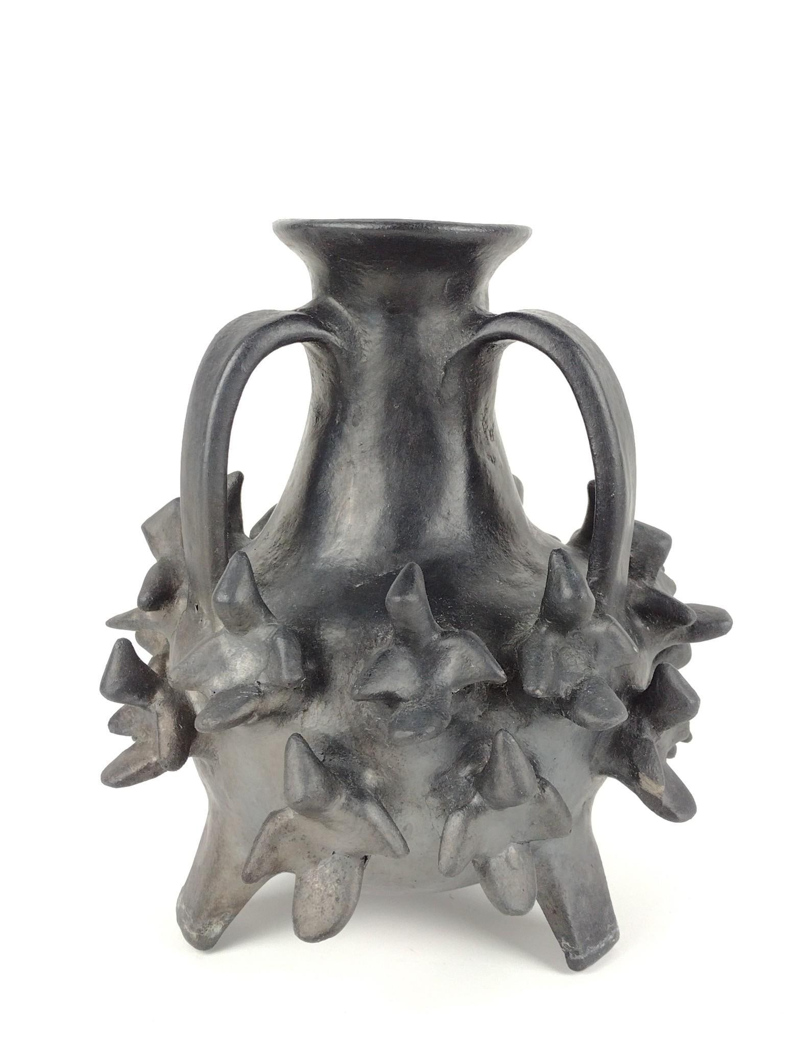 Oaxaca Black Ware Pottery with Birds: 9-1/2" diameter x 10-1/4" high. Unmarked. PROVENANCE: From the Estate of James L. Stanfield, Veteran National Geographic photographer (1937-2023). Mr. Stanfield was one of the world's most outstanding
