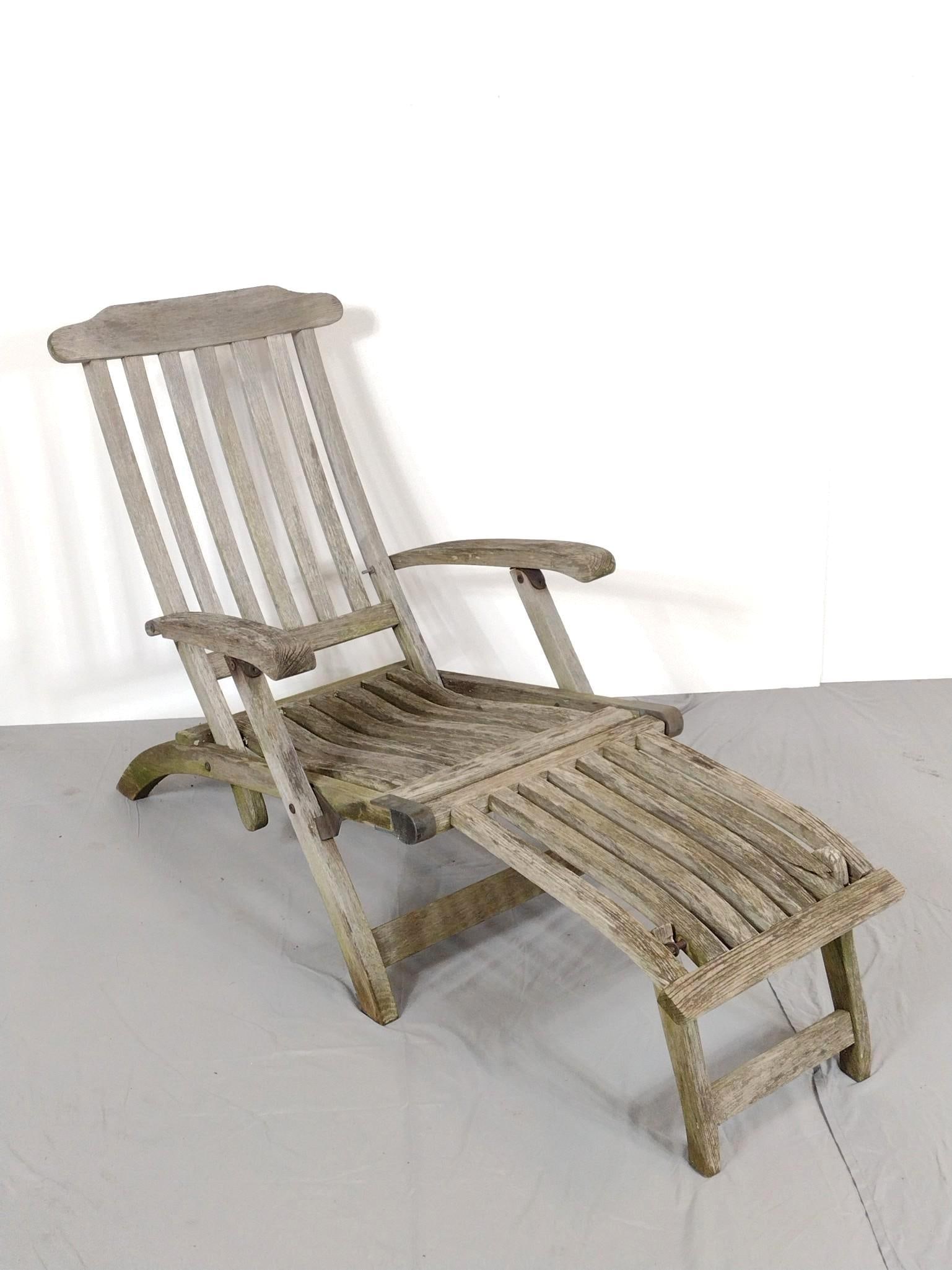 Kingsley-Bate Teak Lounge Chair: NOT ELIGIBLE FOR IN-HOUSE SHIPPING. 25-1/2" wide X 59" deep X 36" high. Has damage to foot rest. PROVENANCE: From the Estate of James L. Stanfield, Veteran National Geographic photographer (1937-2023)