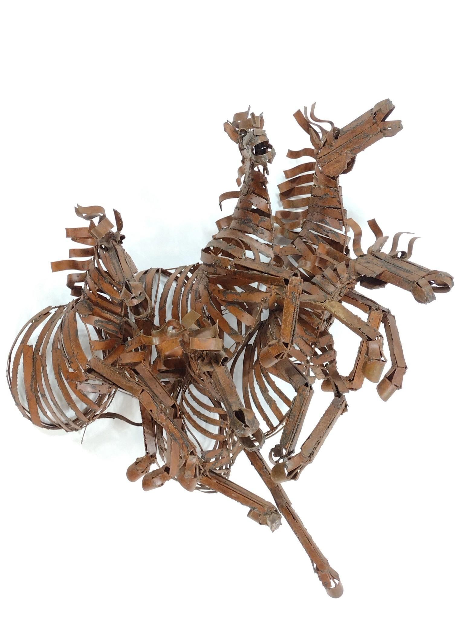 Brutalist Wild Horses Metal Wall Sculpture: NOT ELIGIBLE FOR IN-HOUSE SHIPPING. Purchased in Napa Valley, California. 32" wide x 21" deep x 35" high. PROVENANCE: From the Estate of James L. Stanfield, Veteran National Geographic photographer (1