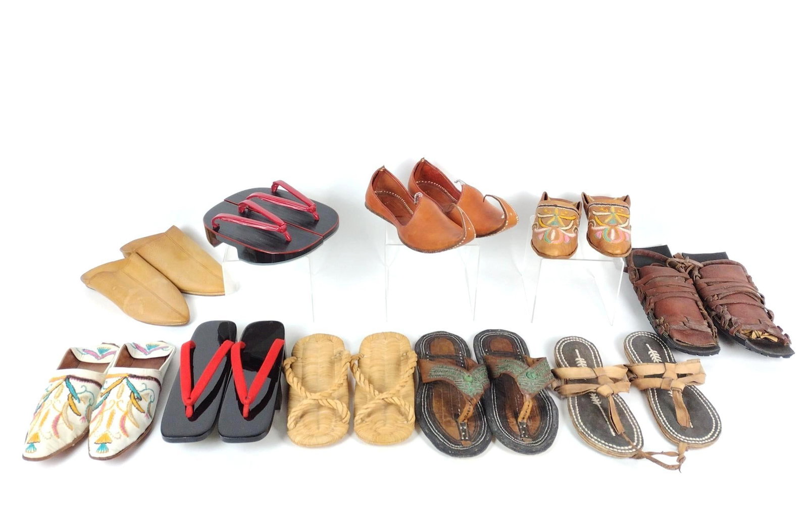 10 Pairs of International Style Shoes: Various sizes. No markings. PROVENANCE: From the Estate of James L. Stanfield, Veteran National Geographic photographer (1937-2023). Mr. Stanfield was one of the world's most outstanding and respected