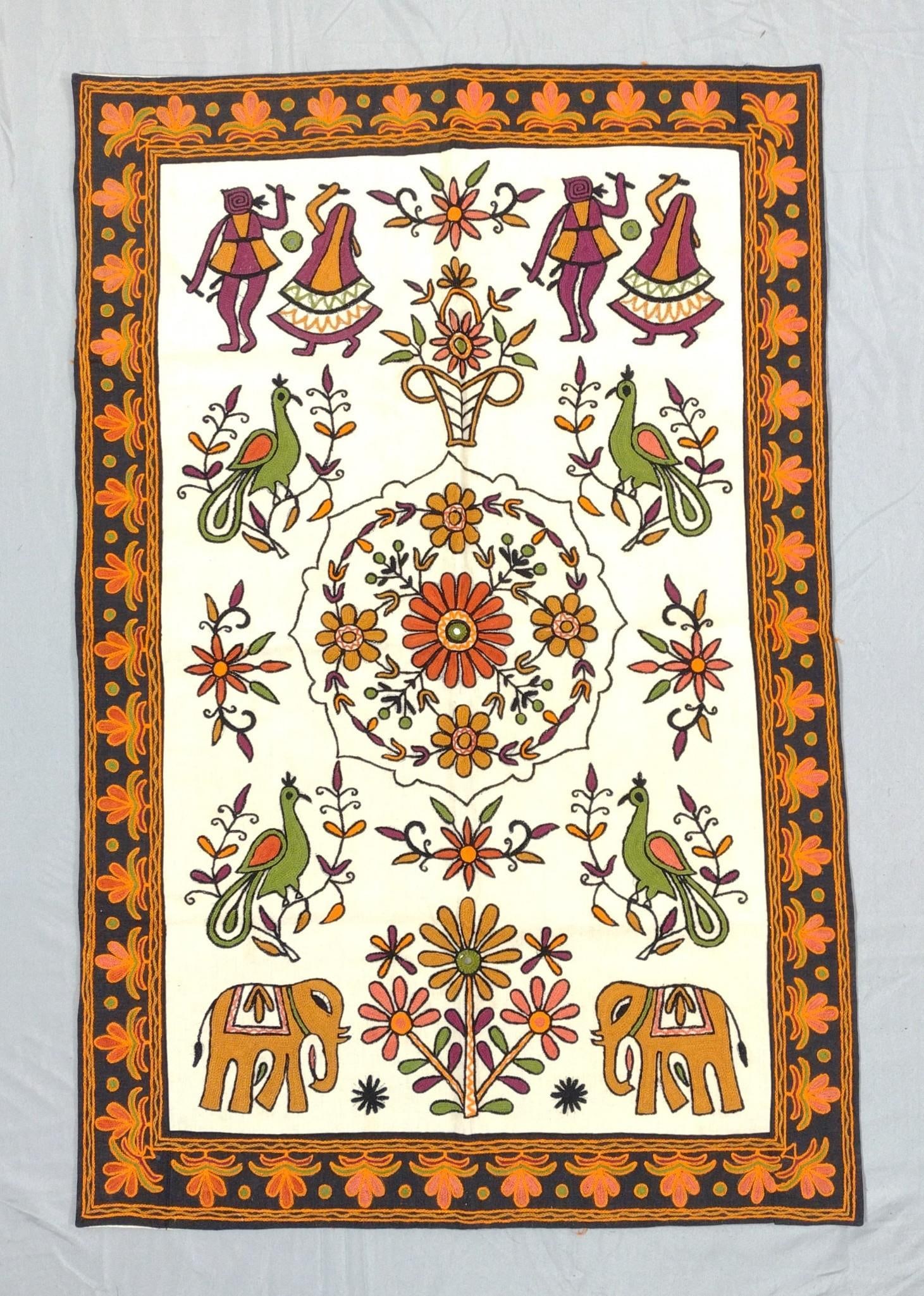 Folk Style Embroidery Depicting Dancing Scene: 24" wide x 36-1/4" high. PROVENANCE: From the Estate of James L. Stanfield, Veteran National Geographic photographer (1937-2023). Mr. Stanfield was one of the world's most outstanding and respected ph