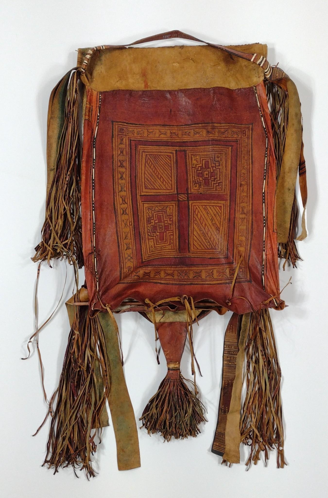 Tuareg Leather Camel Bag: NOT ELIGIBLE FOR IN-HOUSE SHIPPING. 21” wide x 76" high. PROVENANCE: From the Estate of James L. Stanfield, Veteran National Geographic photographer (1937-2023). Mr. Stanfield was one of the wor