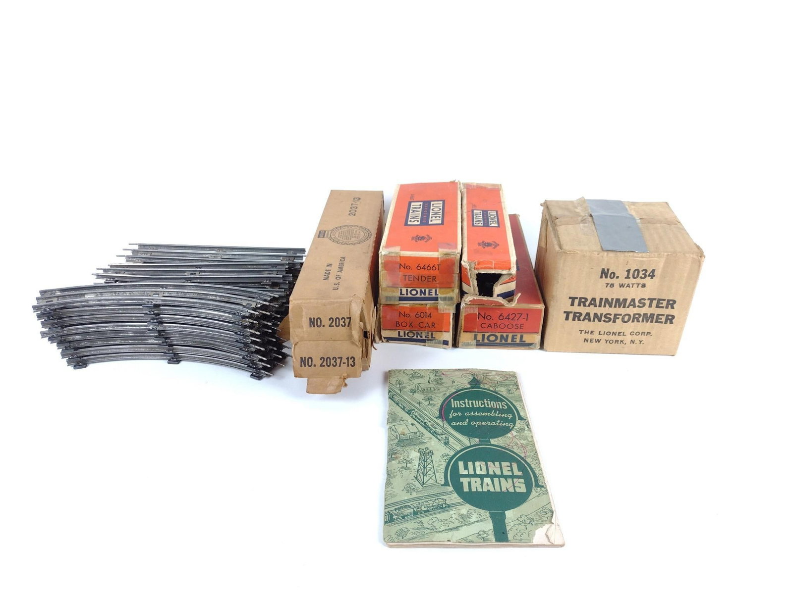 Lionel 2026 Engine with 3 Cars, Tender and Transformer: Also includes track. Engine plaque "Lionel O27". Untested.