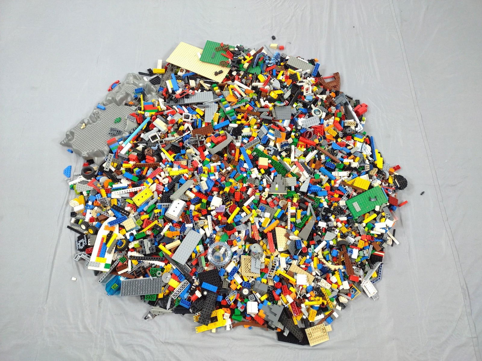 25 Lbs Legos: Various parts and pieces. May include non-Lego pieces.