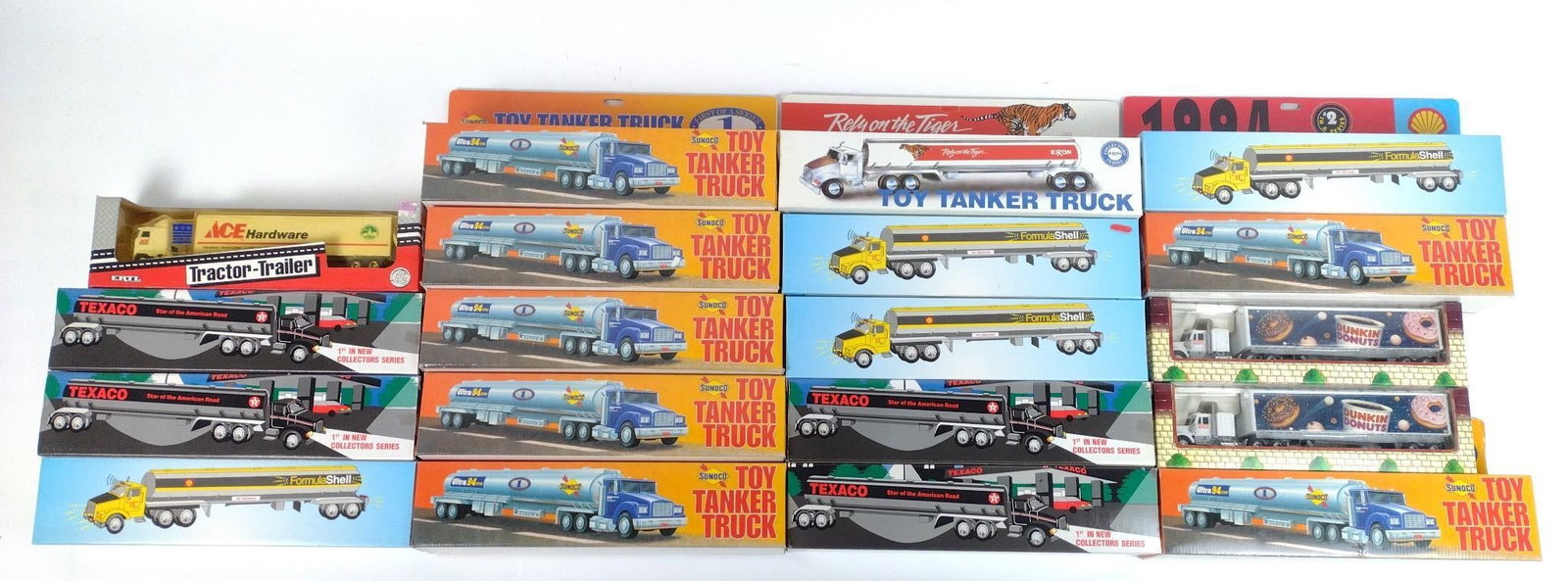 19 Die Cast Tanker Trucks: Includes Sunoco, Exxon, Shell, and more. All appear to be new in box.