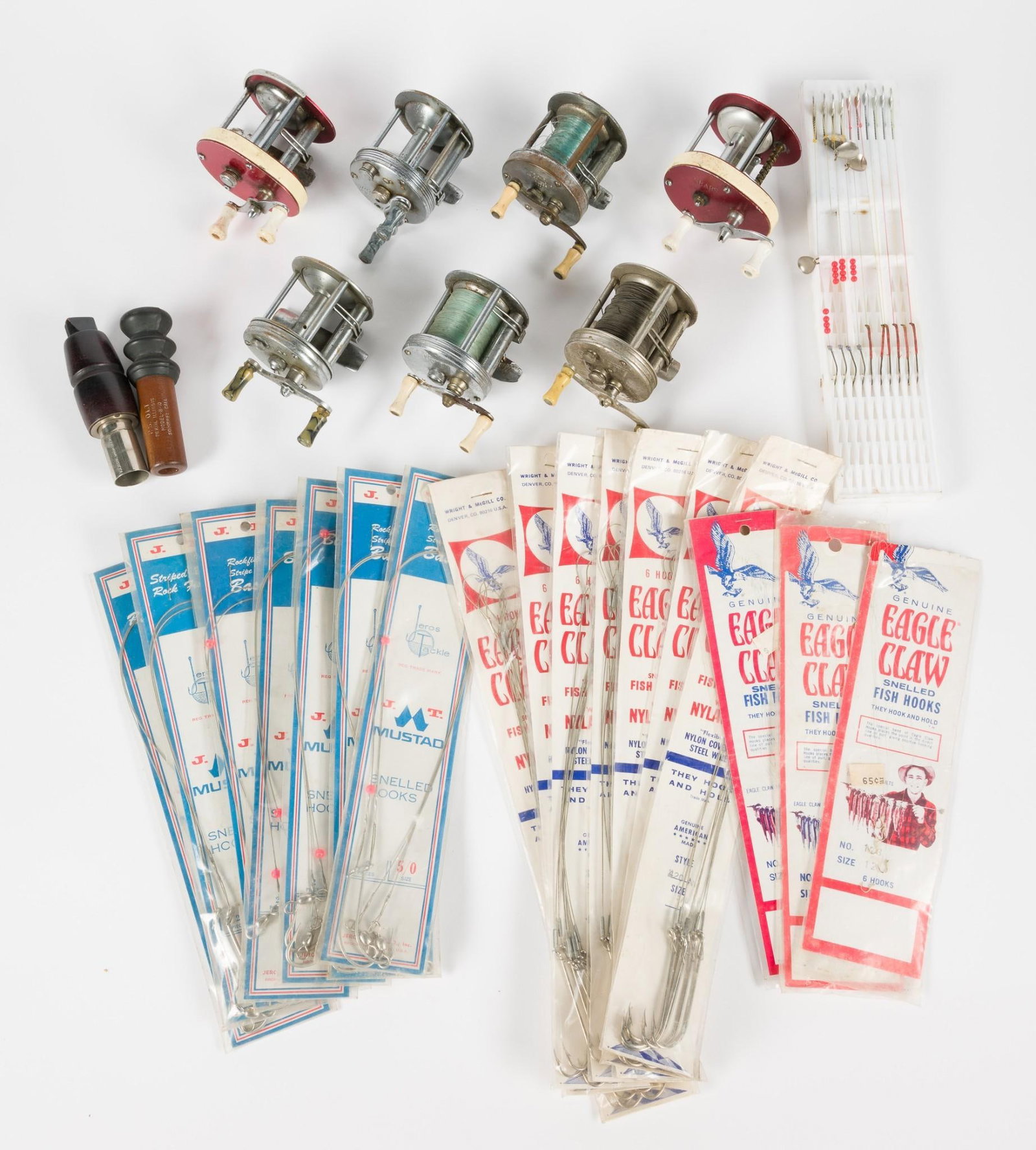 7 Fishing Reels, 2 Hunting Calls and Fishing Hooks: Includes Shakespeare, 4 brothers, and more.