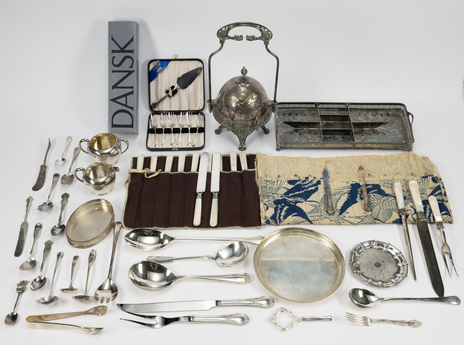 62 Pcs. Silverplate: Includes Reed & Barton; Gorham; Dansk; William A. Rogers; and more. Trays measure 5-3/8" to 14-1/2" wide x 7/8" to 2-1/4" high.