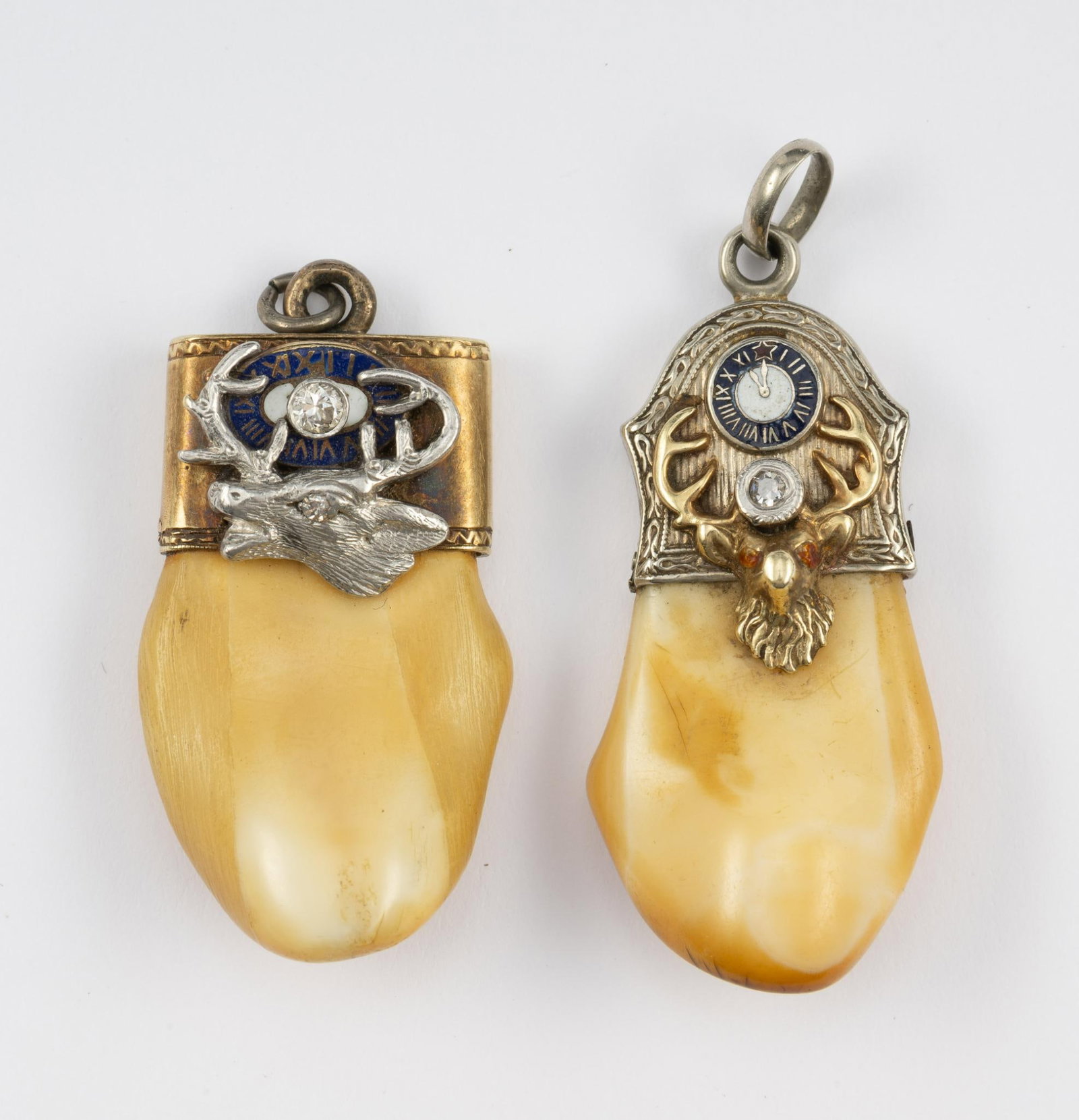 2 Fraternal Order of the Elks Pendants: Elk's Lodge pendants with tooth, gold, and diamonds. 1-3/8" to 1-1/2" high.