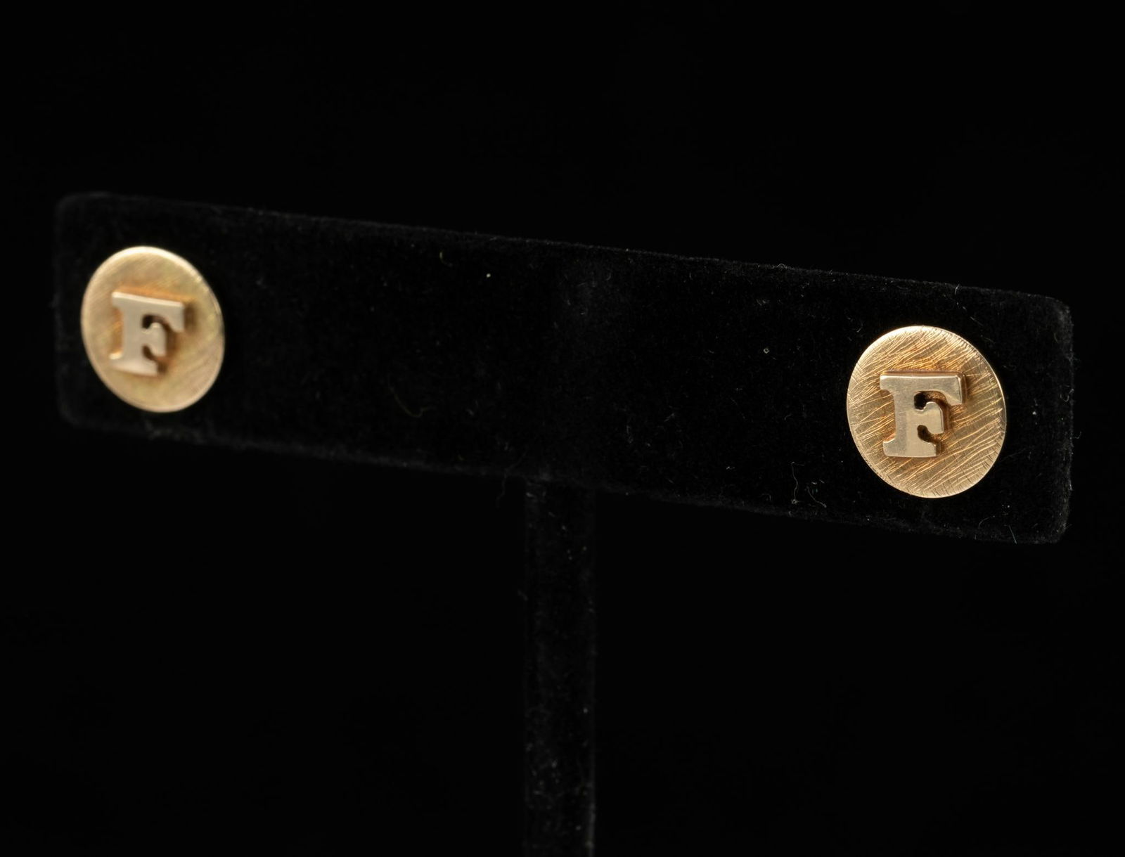 14K Gold Letter "F" Button Earrings: 3/8" diameter button earrings with "F" emblem. Pierced. 2.8 grams.