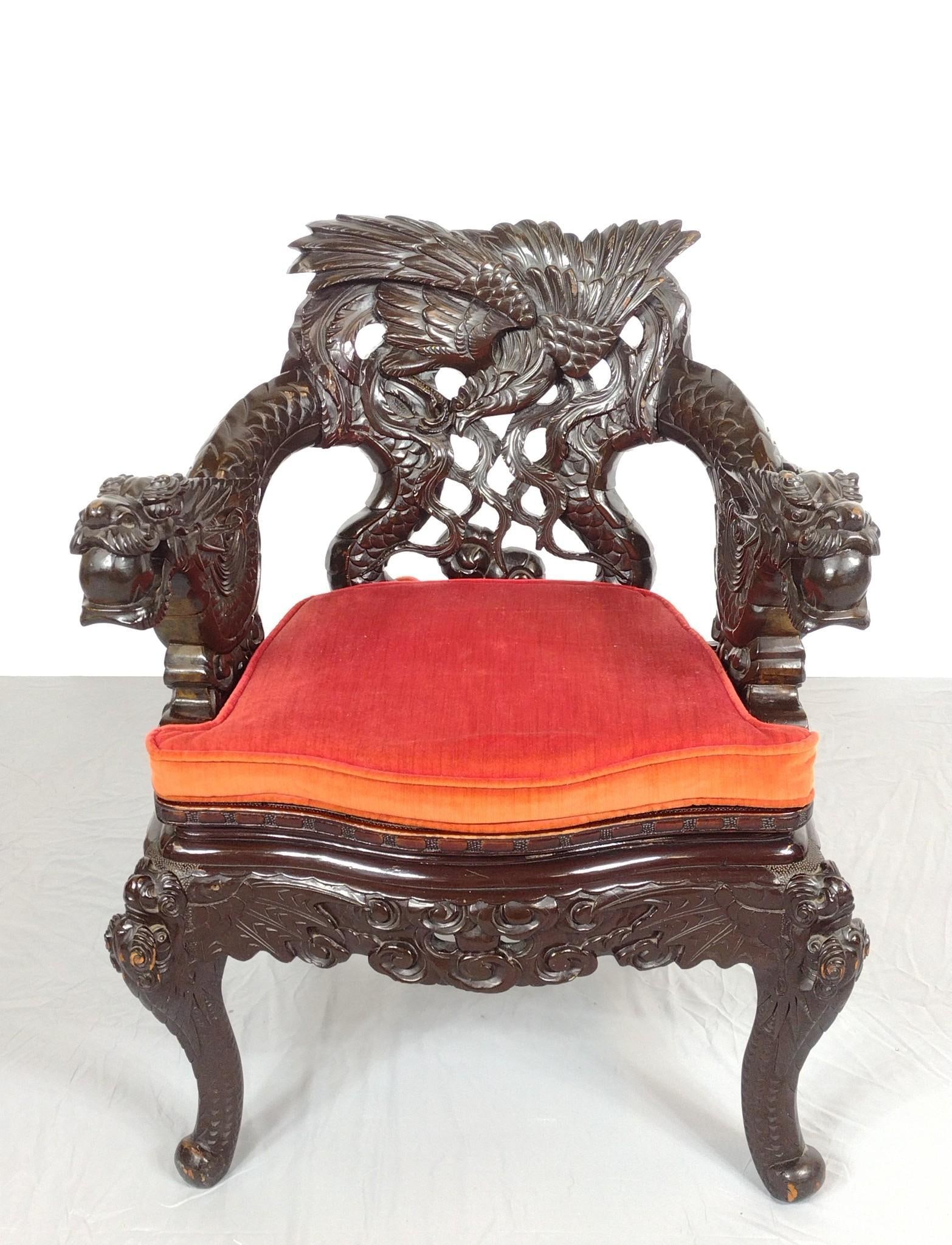 Asian Dragon Carved Arm Chair: NOT ELIGIBLE FOR IN-HOUSE SHIPPING. 27" wide X 19-1/2" deep X 33-3/4" high. Has some light scratches and areas of finish loss.