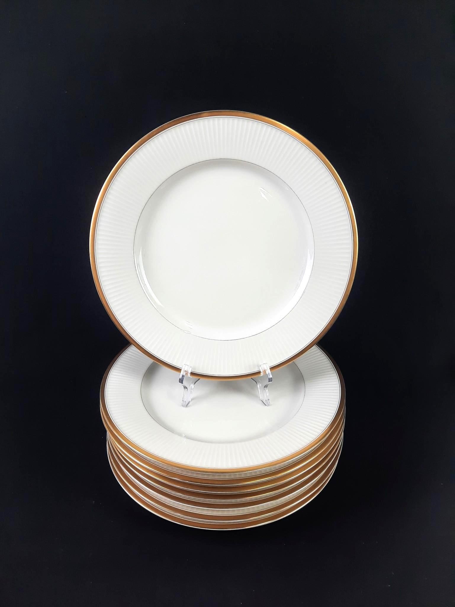 8 Fitz and Floyd "Classique d'Or" Plates: Each: 12" diameter.