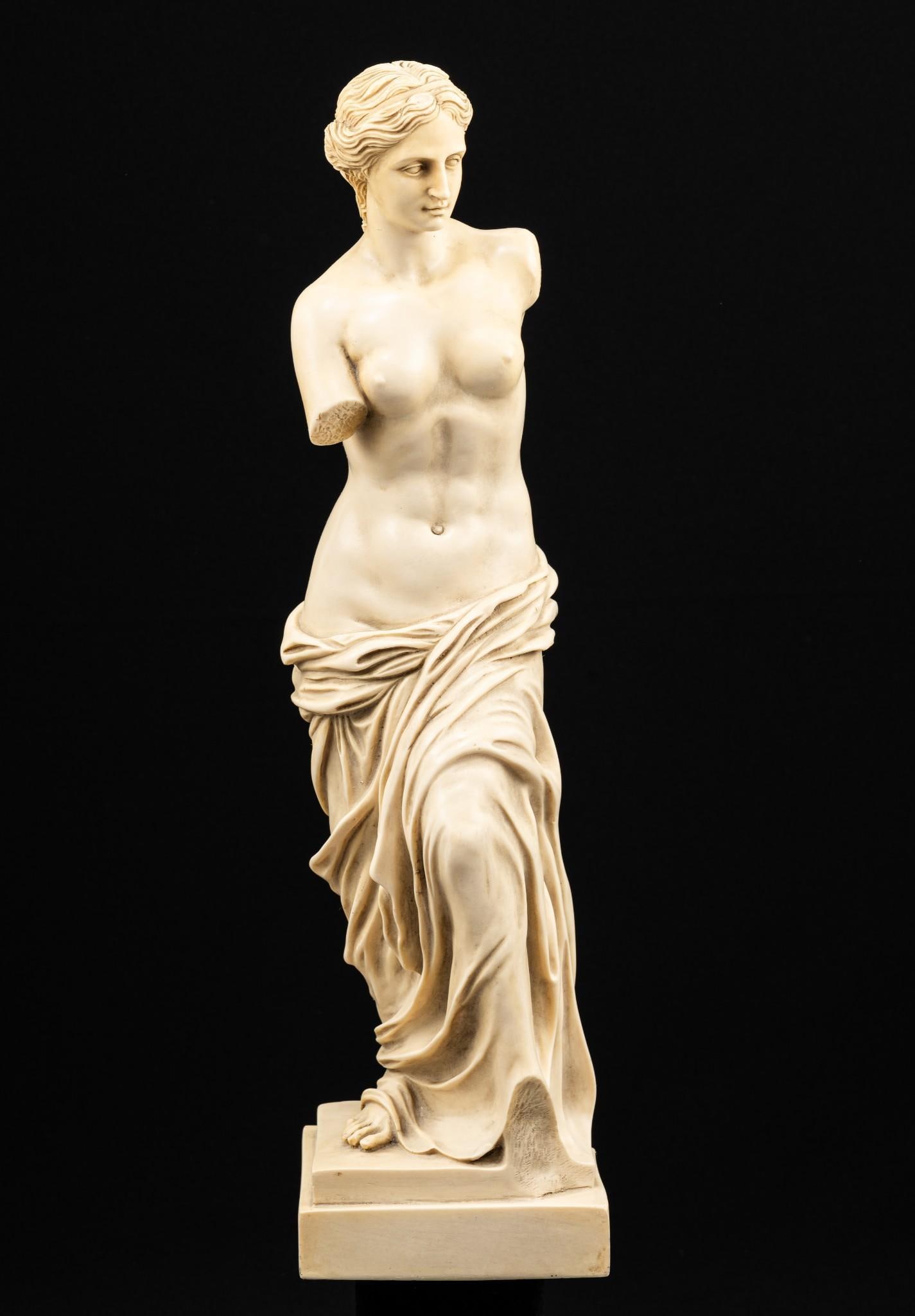 The Venus de Milo Figurine: Marked "C R CCFRI" on base at back. 4" wide x 3-1/2" deep x 15-1/4" high.