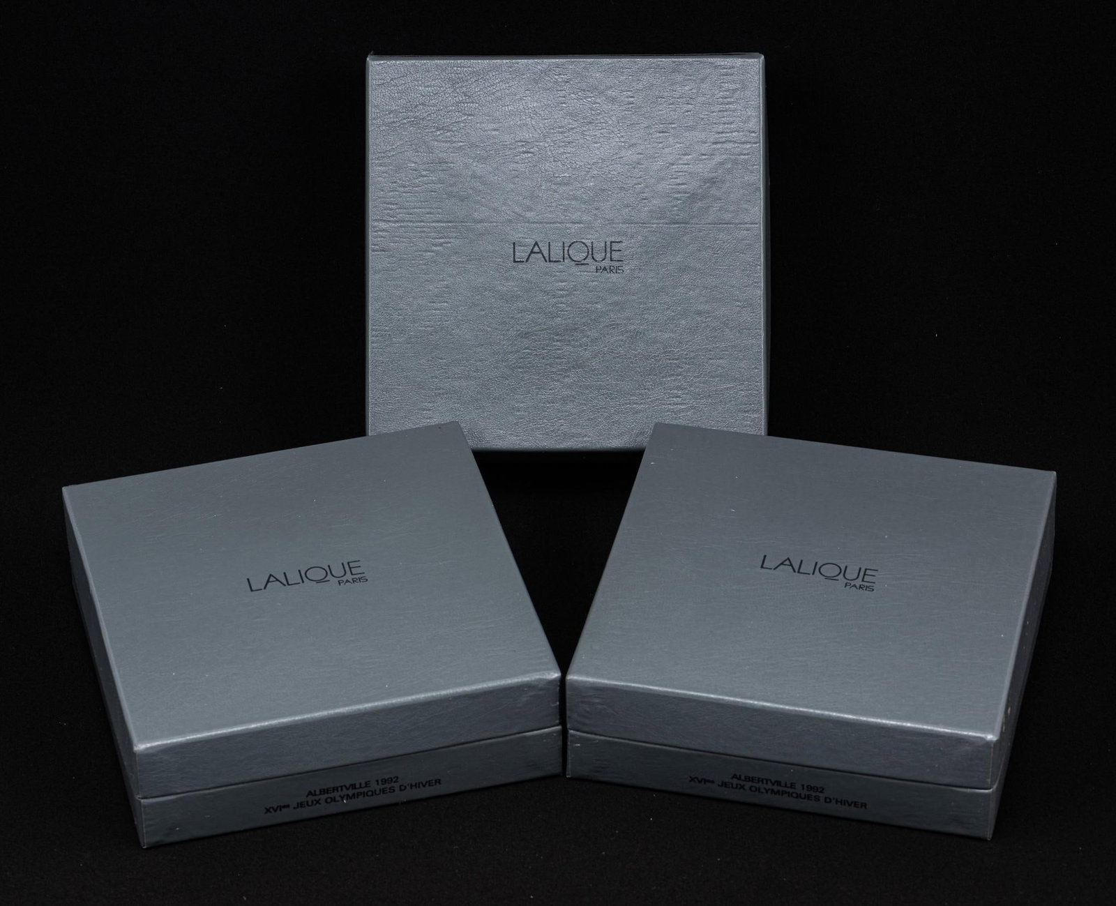 3 Lalique Olympic Commemoratives: Each 3-1/2" wide x 1" deep x 4" high.