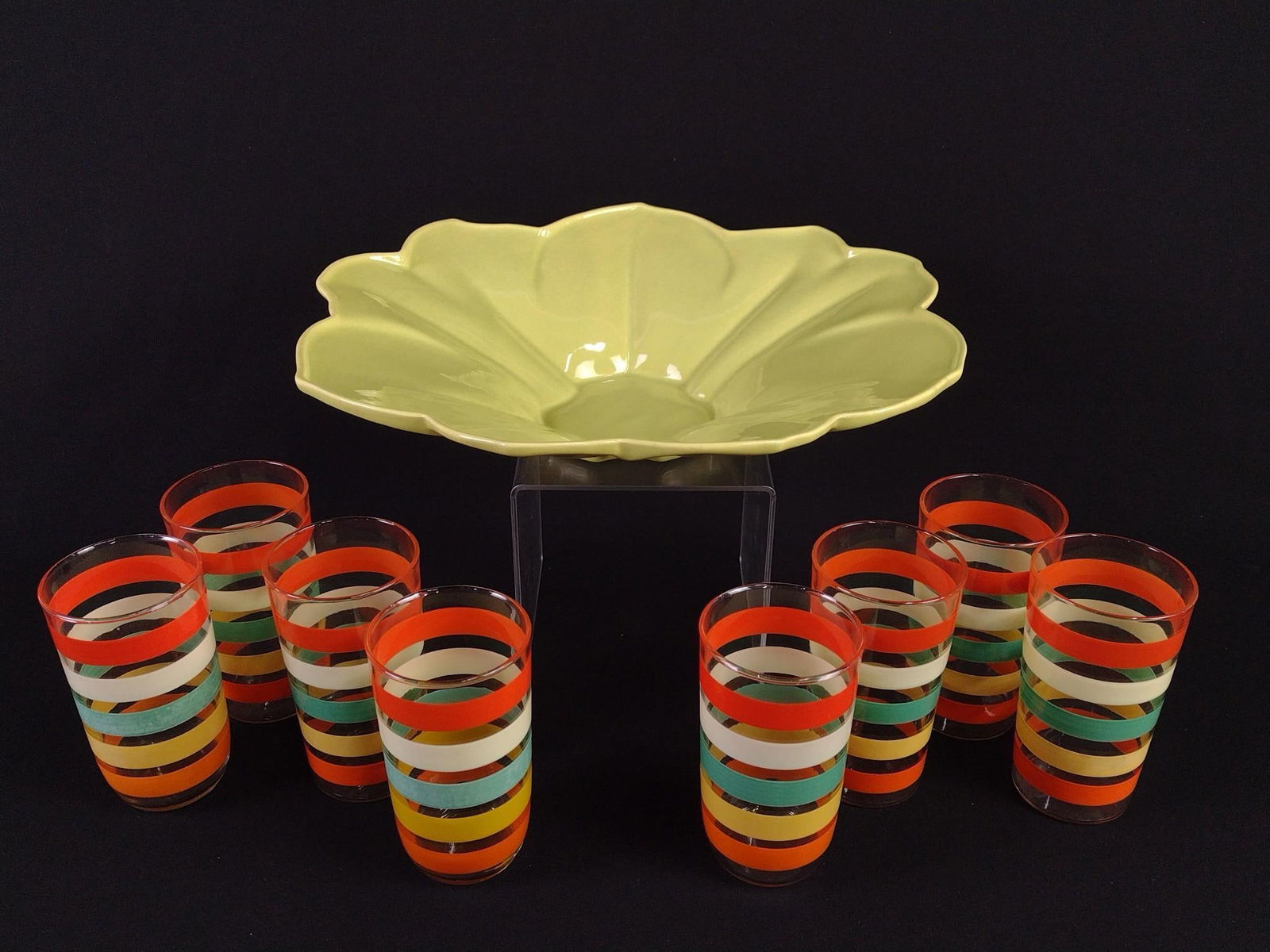 John Wright Floral Plate and 8 Vintage Glasses: John Wright plate: 13" diameter x 2-1/2" high. Glasses: 2-1/2" to 4-1/2" high. Some fading and discoloration.