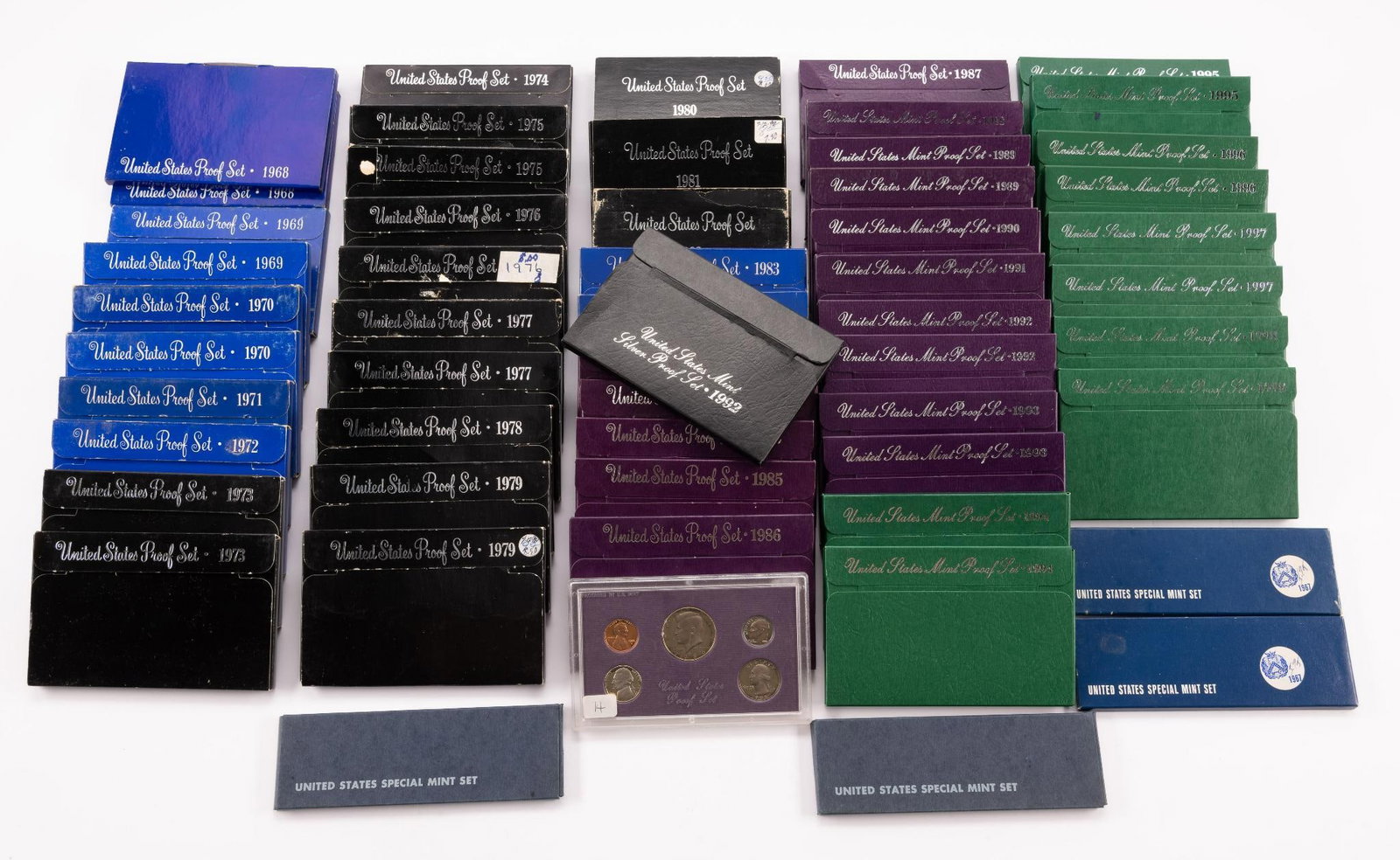 56 Proof Sets Including Silver: Proof sets from 1967 through 1998 with duplicate dates and possibly missing dates. Eight of the sets are from the 40% silver Kennedy period.