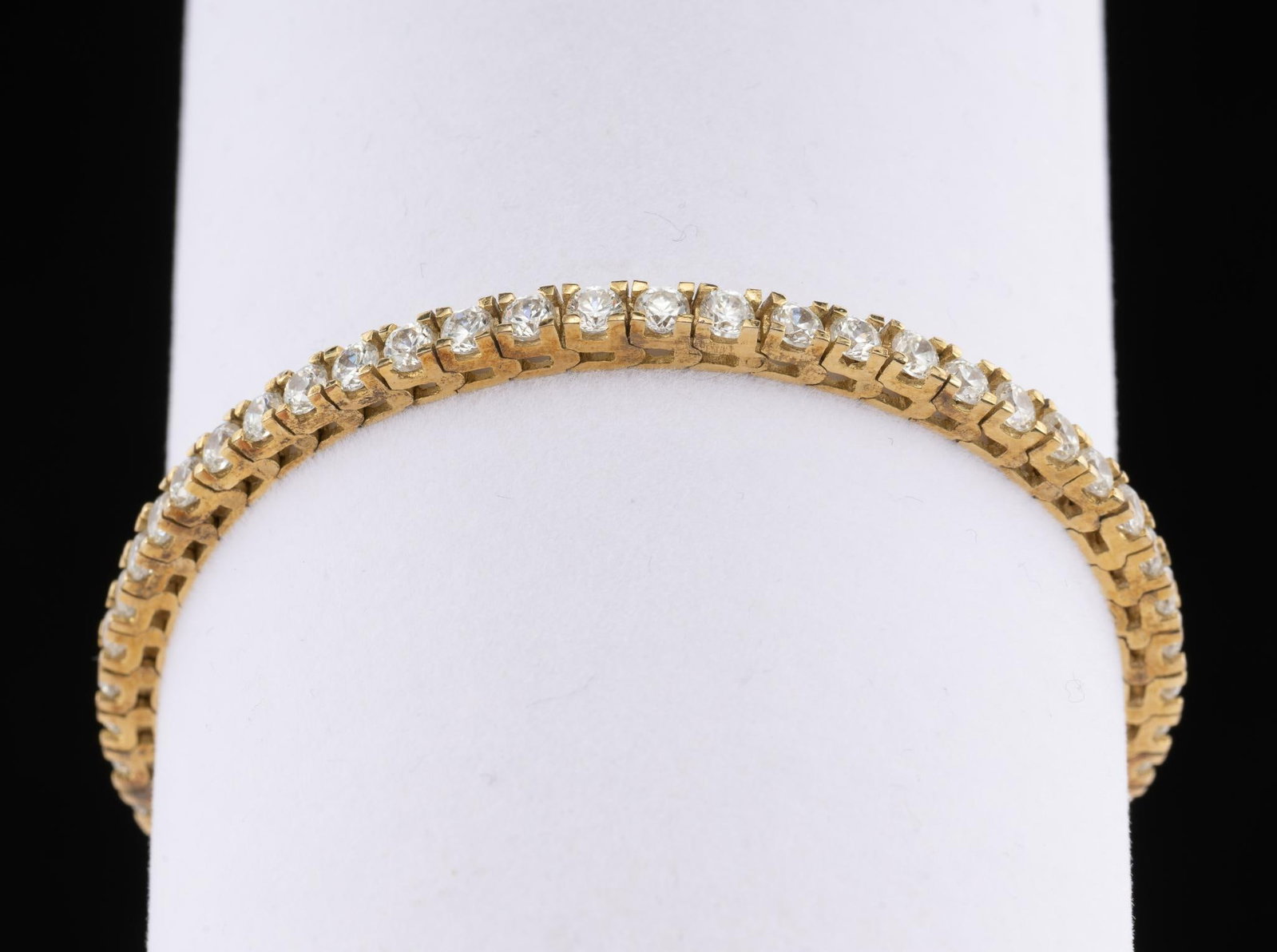 Nina Rossini Gold Vermeil & CZ Tennis Bracelet: 6 3/4" length with CZ enhancements to this bracelet which is solid sterling silver with gold plating.