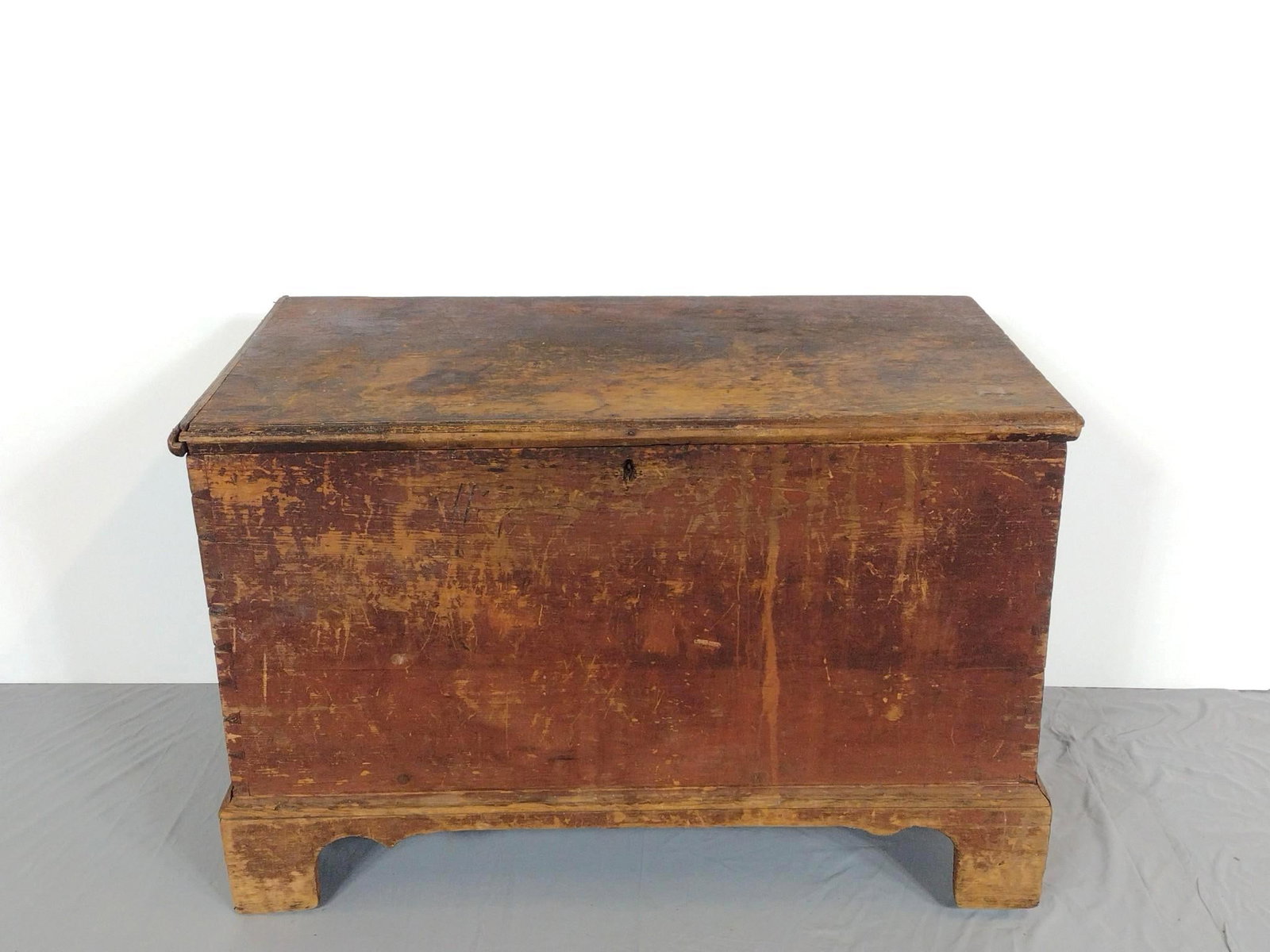 Antique Blanket Chest: NOT ELIGIBLE FOR IN-HOUSE SHIPPING. 37" wide X 20" deep X 24-1/2" high. Has finish loss. Also missing lid trim on right side. Missing rear foot on right side.