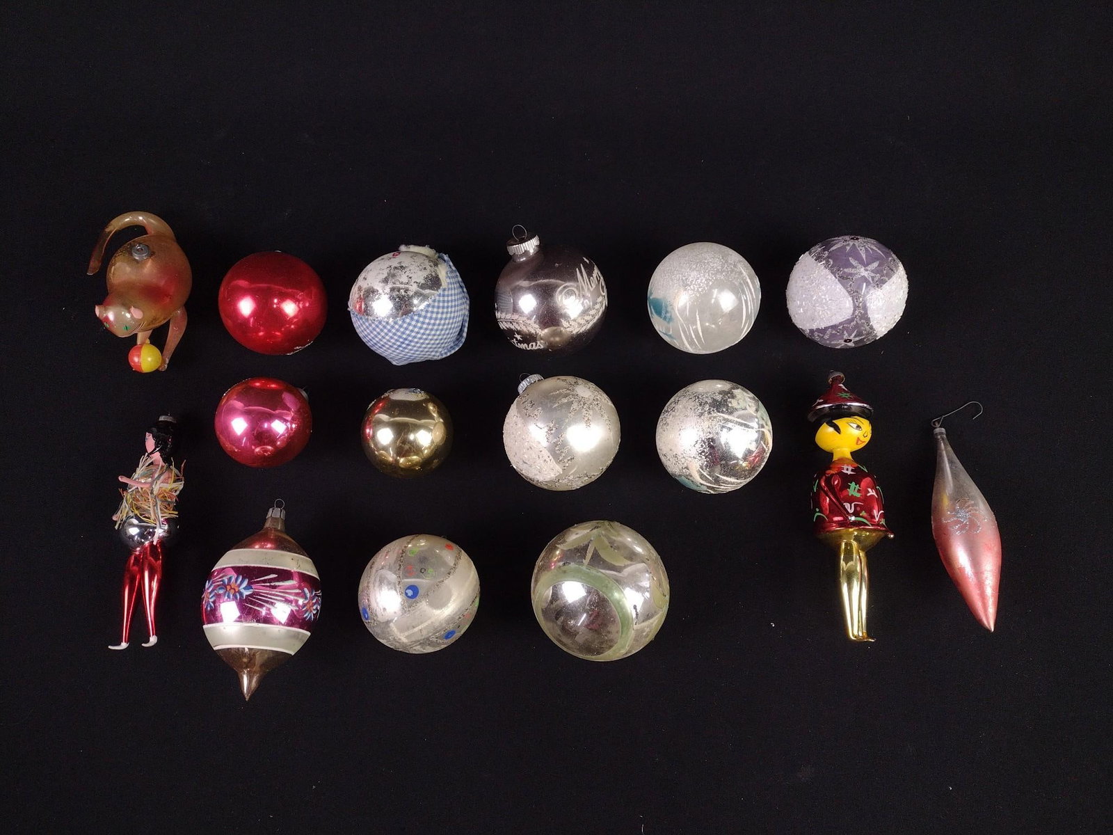 16 Antique Christmas Ornaments: 2-1/4" to 6-3/4" high. Some wear and paint losses consistent with age and use.