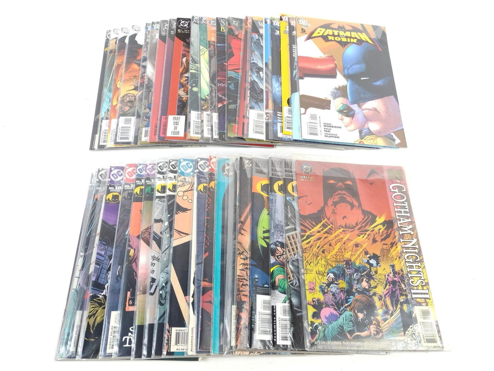 49 Batman Comics incl Robbin: Also includes Gotham Nights, Gotham Central, Spawn, and more. All with minimal wear.