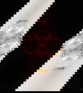 18K Gold, Pearl & Diamond Ring: DESCRIPTION: 18k gold ring set with four 8.4-8.5mm each pearls and eight approximately .08 carat each round brilliant cut diamonds. MEASUREMENTS: 11.3 grams. Size 7. CONDITION: Very light wear.