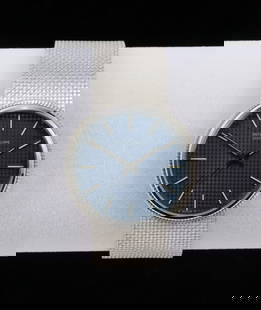 18K White Gold Patek Philippe Model 3563 Box Papers: DESCRIPTION: A white gold bracelet watch manufactured in 1977. Model 3563/3 automatic movement. Apparently barely worn. The watch is almost without contact marks and the mesh bracelet is in perfect