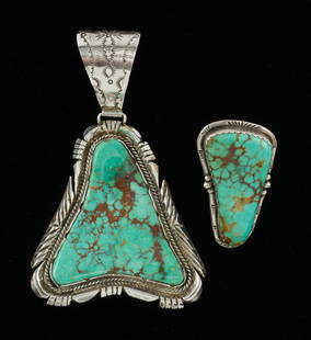 Sterling Silver Turquoise Pendant And Ring: DESCRIPTION: A huge Royston turquoise and silver pendant by Lee Bennett, Navajo with matching and also quite large ring. MEASUREMENTS: Pendant 4 1/4" and ring 2 1/2", size 8. Total weight 80 grams