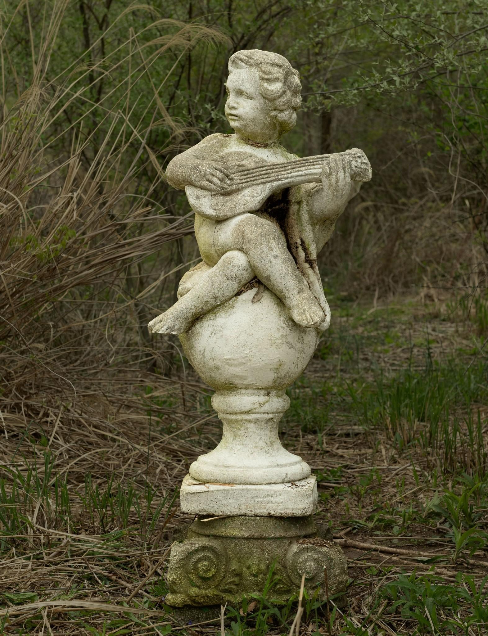 Concrete Cherub Playing Instrument Statue (1 of 4)