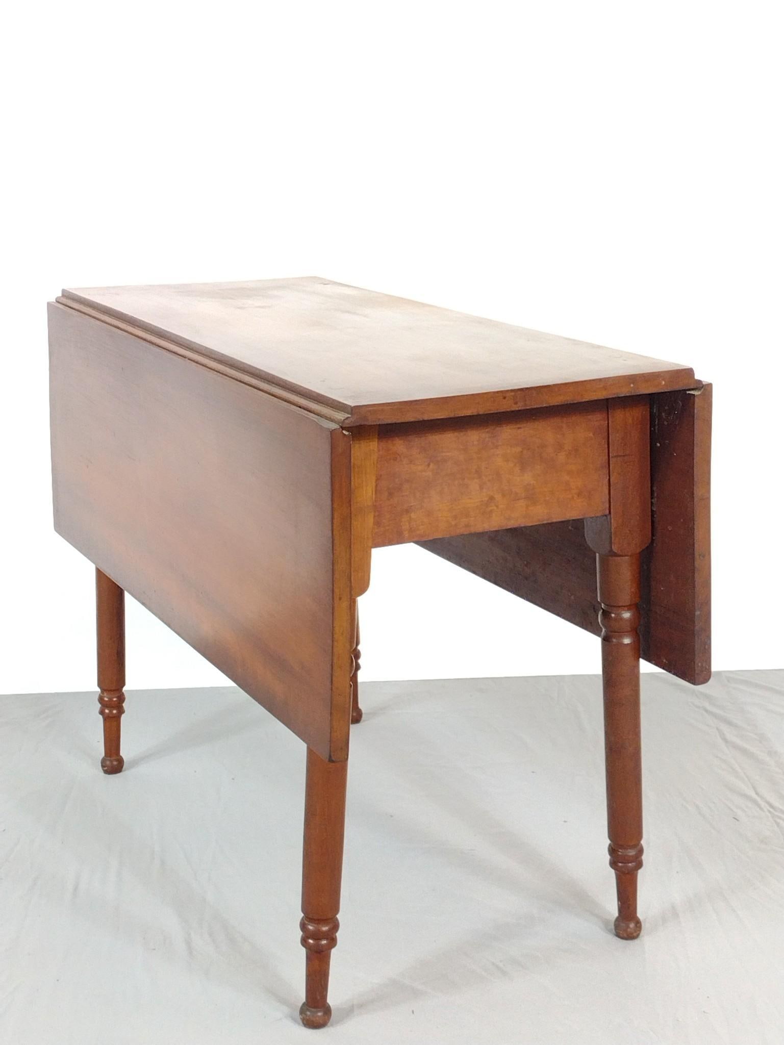 Drop Leaf Dining Table: NOT ELIGIBLE FOR IN-HOUSE SHIPPING. Open 44", closed 18" wide X 38-3/4" deep X 28-1/2" high. Has some scratches.