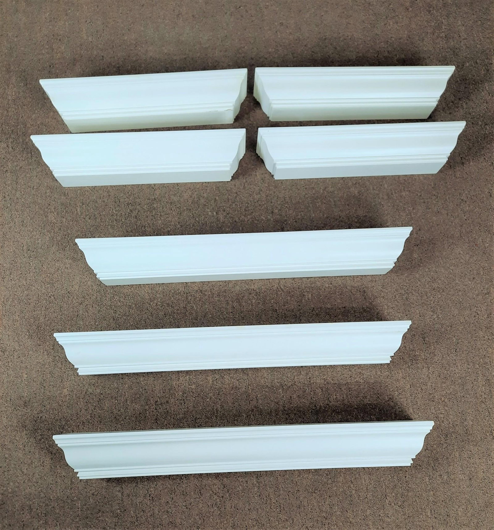 7 Floating Wall Shelves: NOT ELIGIBLE FOR IN-HOUSE SHIPPING. Various sizes. Some paint loss.