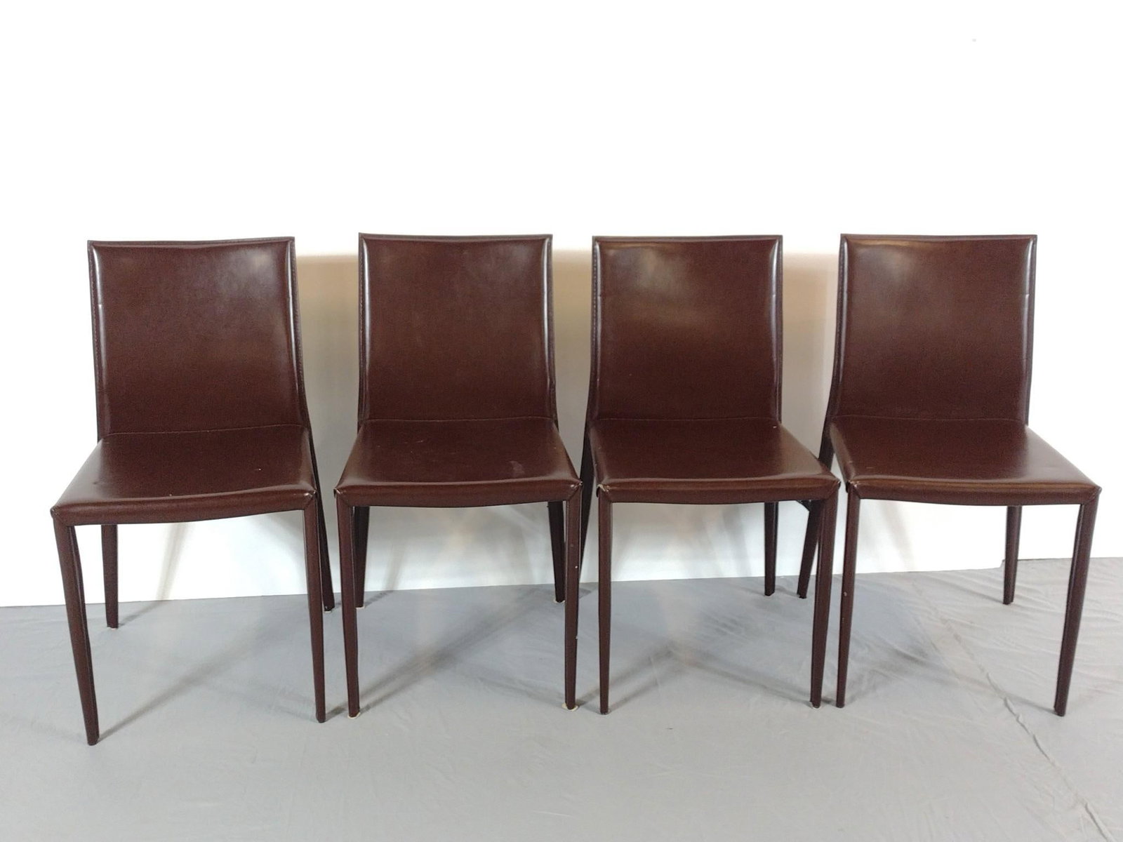 4 Euro Style Inc. Leather Chairs: NOT ELIGIBLE FOR IN-HOUSE SHIPPING. Each 18" wide X 19" deep X 32-1/2" high.