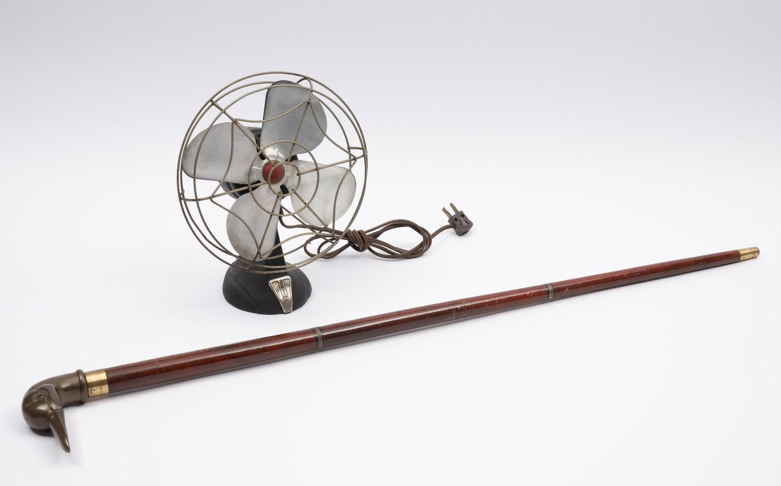 Eskimo Vintage Fan and Walking Stick with Brass Duck: Walking stick is collapsible. 35" long. Fan is working. 12" high.